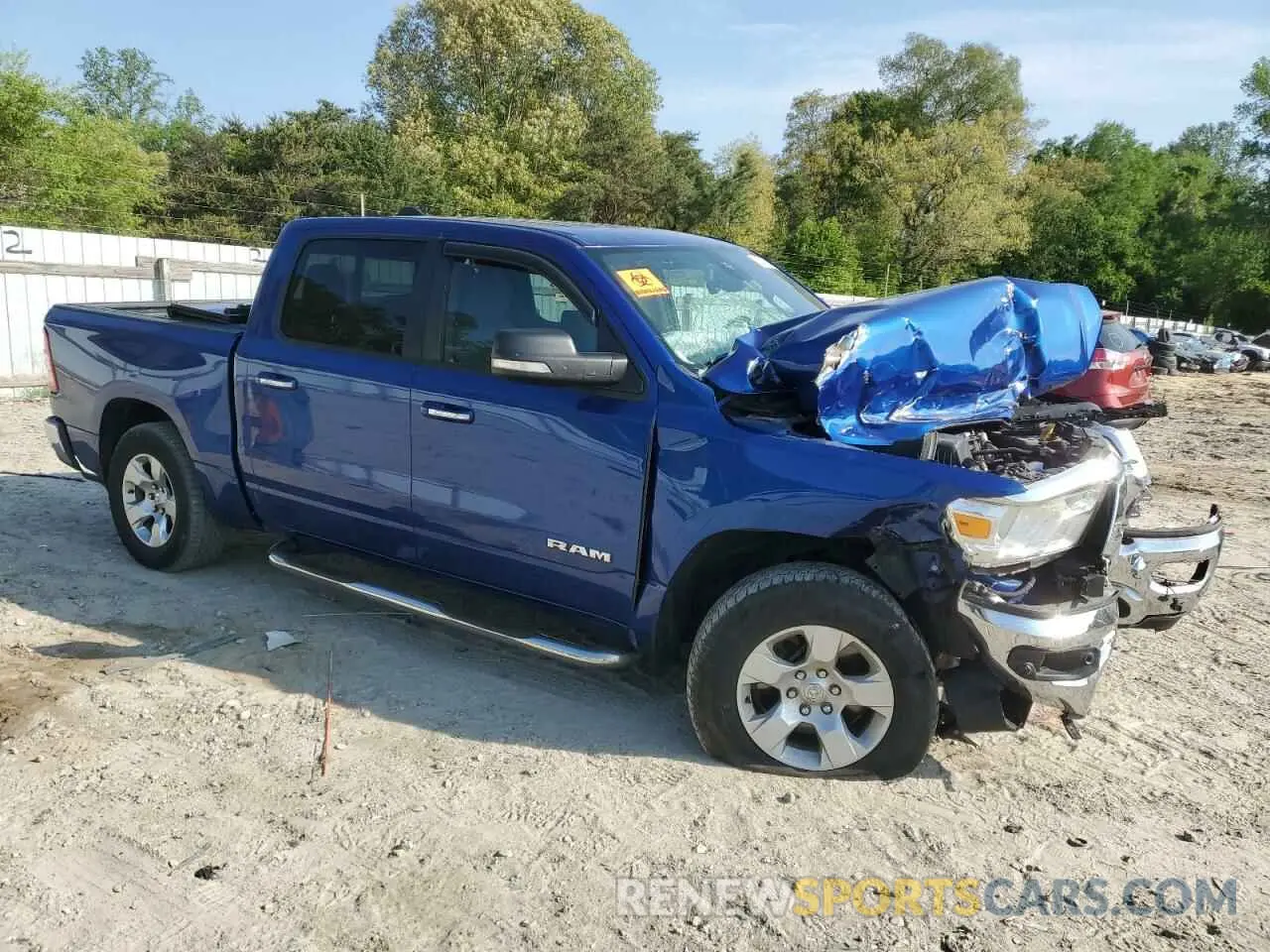 4 Photograph of a damaged car 1C6SRFFT7KN663257 RAM 1500 2019