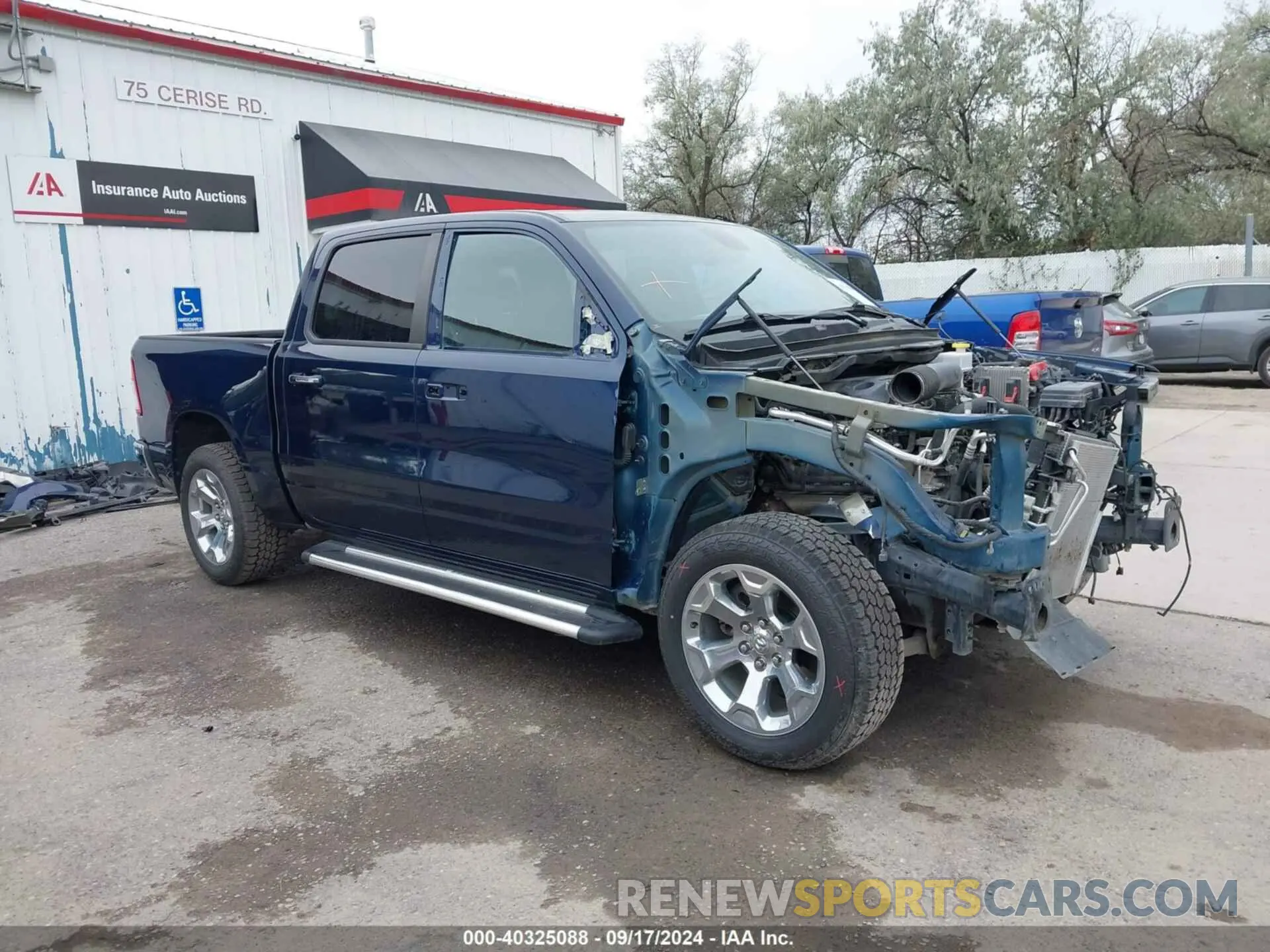 1 Photograph of a damaged car 1C6SRFFT7KN663677 RAM 1500 2019