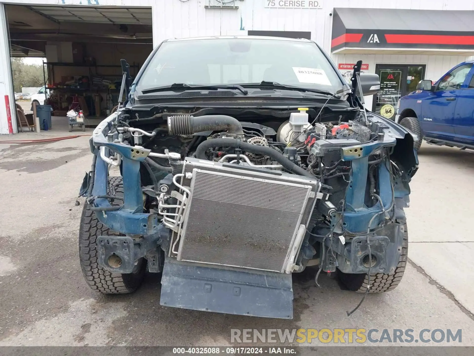 13 Photograph of a damaged car 1C6SRFFT7KN663677 RAM 1500 2019