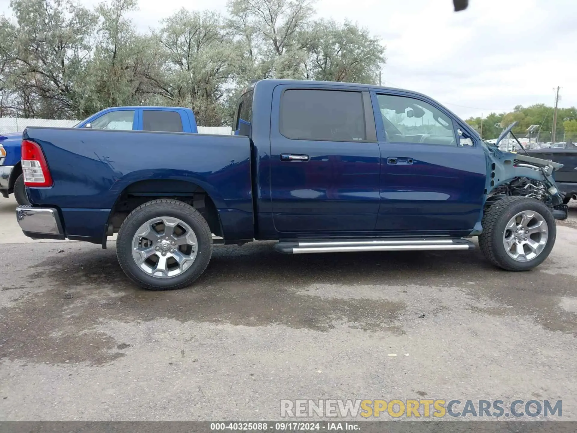 14 Photograph of a damaged car 1C6SRFFT7KN663677 RAM 1500 2019