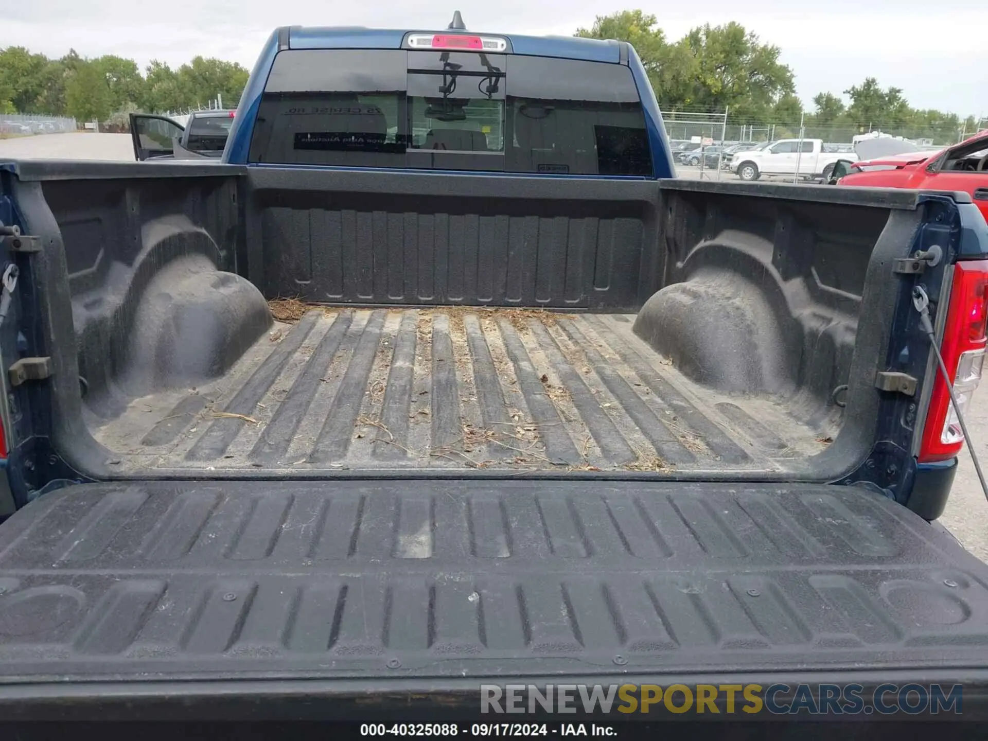 19 Photograph of a damaged car 1C6SRFFT7KN663677 RAM 1500 2019