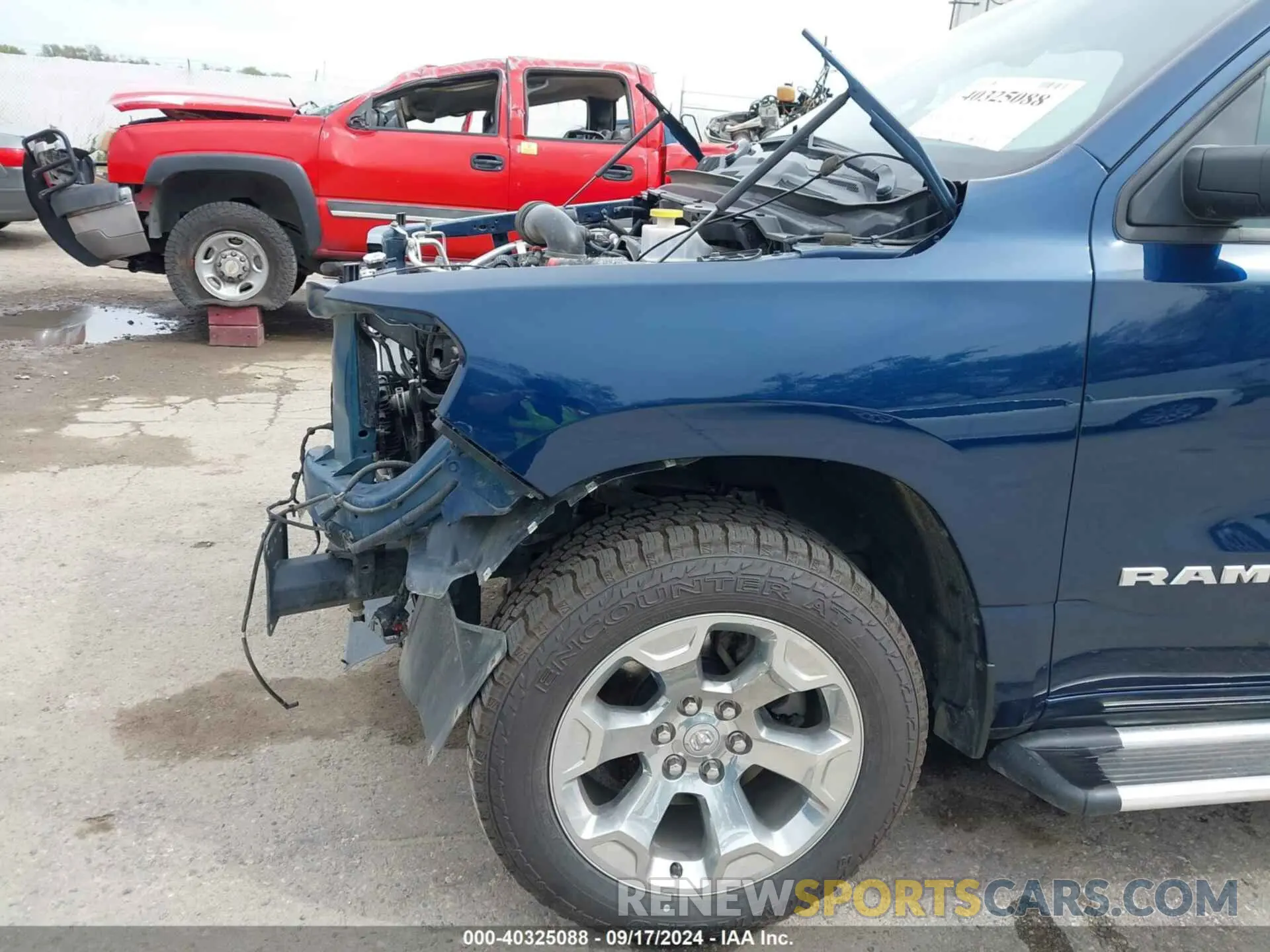 21 Photograph of a damaged car 1C6SRFFT7KN663677 RAM 1500 2019