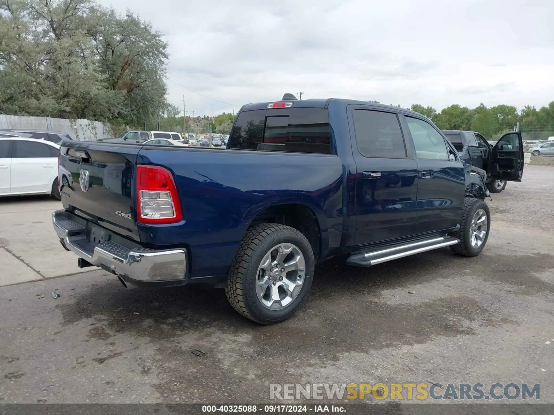4 Photograph of a damaged car 1C6SRFFT7KN663677 RAM 1500 2019