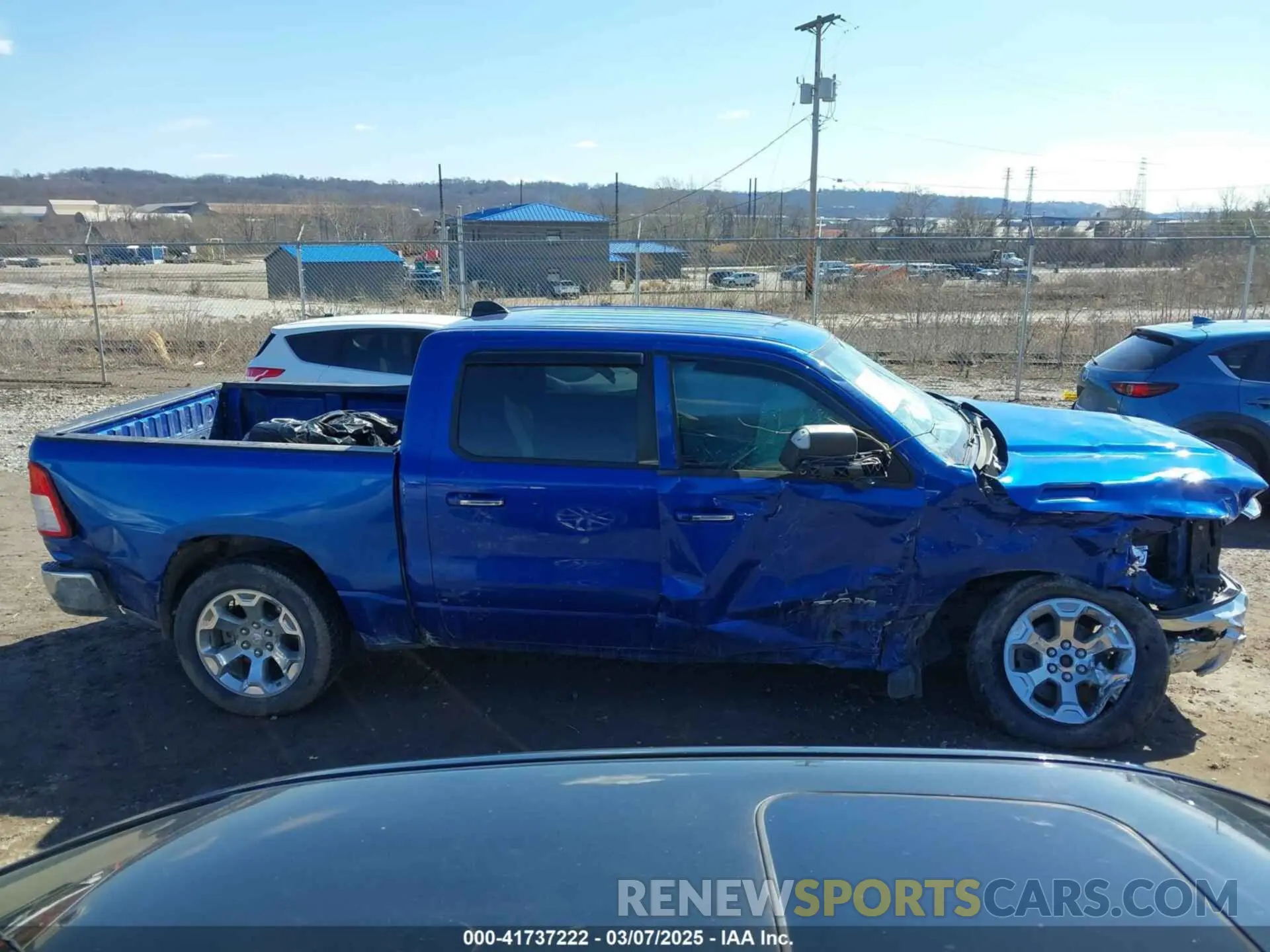 13 Photograph of a damaged car 1C6SRFFT7KN789375 RAM 1500 2019