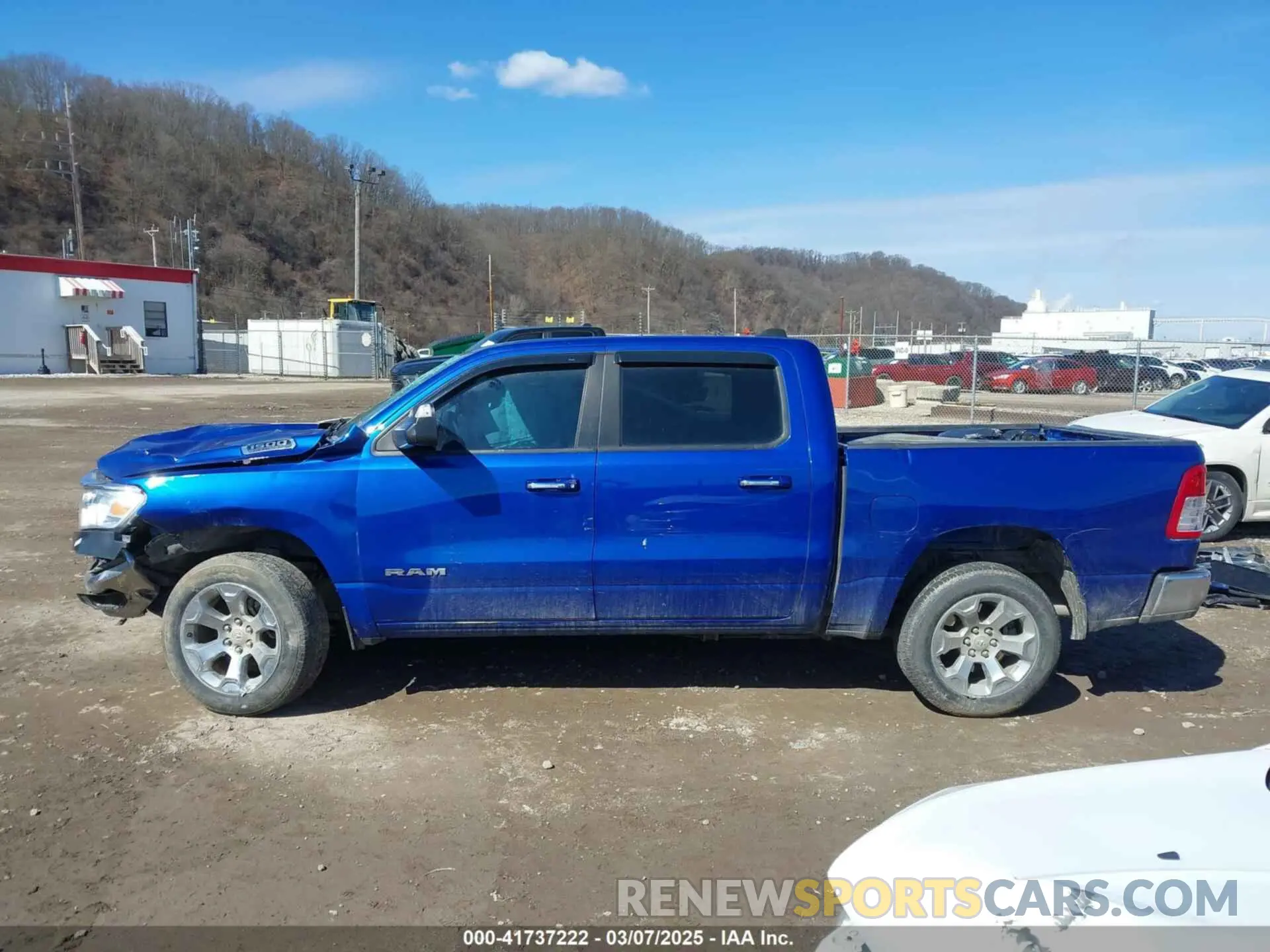 14 Photograph of a damaged car 1C6SRFFT7KN789375 RAM 1500 2019
