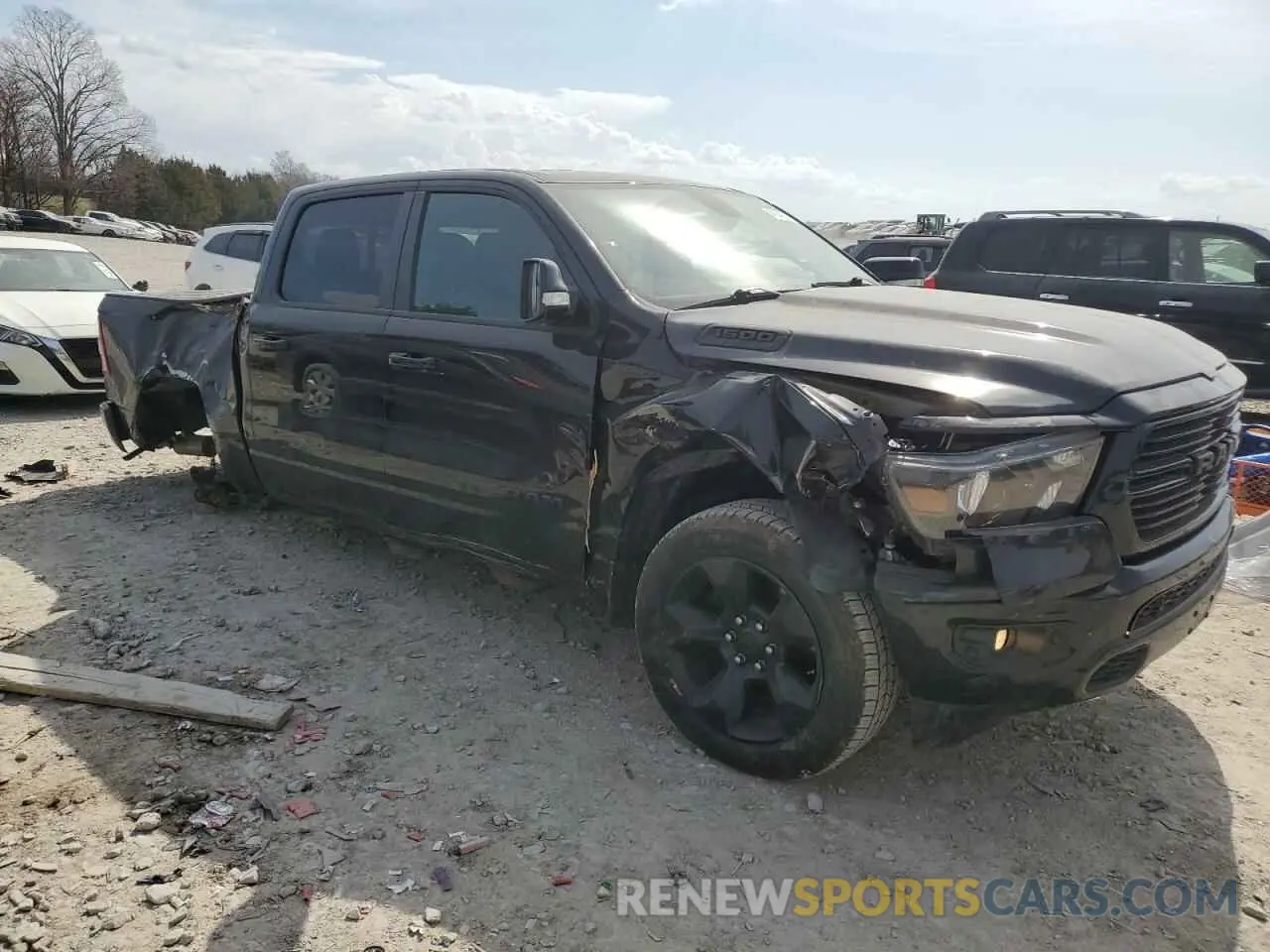 4 Photograph of a damaged car 1C6SRFFT7KN796990 RAM 1500 2019