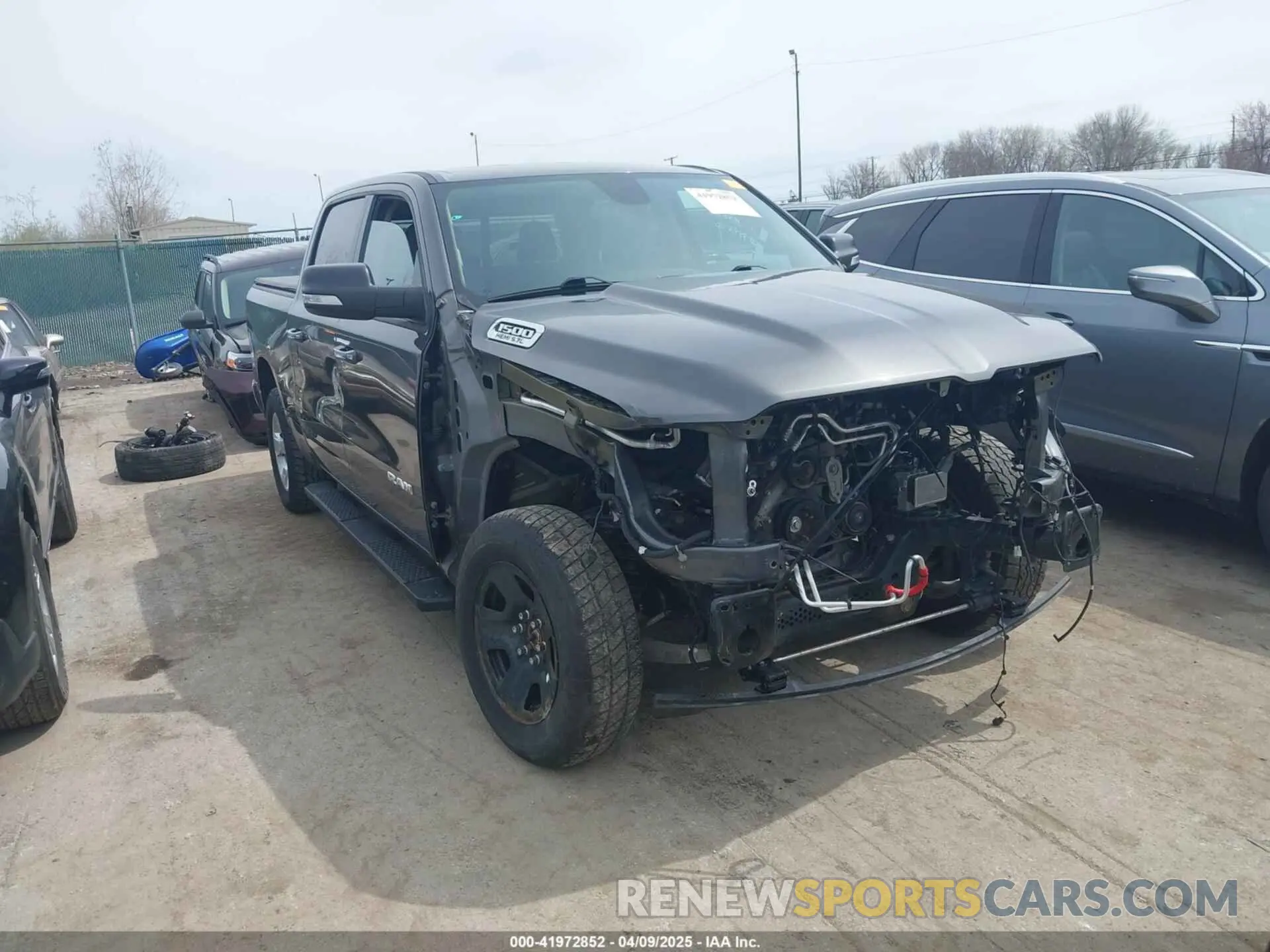 1 Photograph of a damaged car 1C6SRFFT7KN876256 RAM 1500 2019