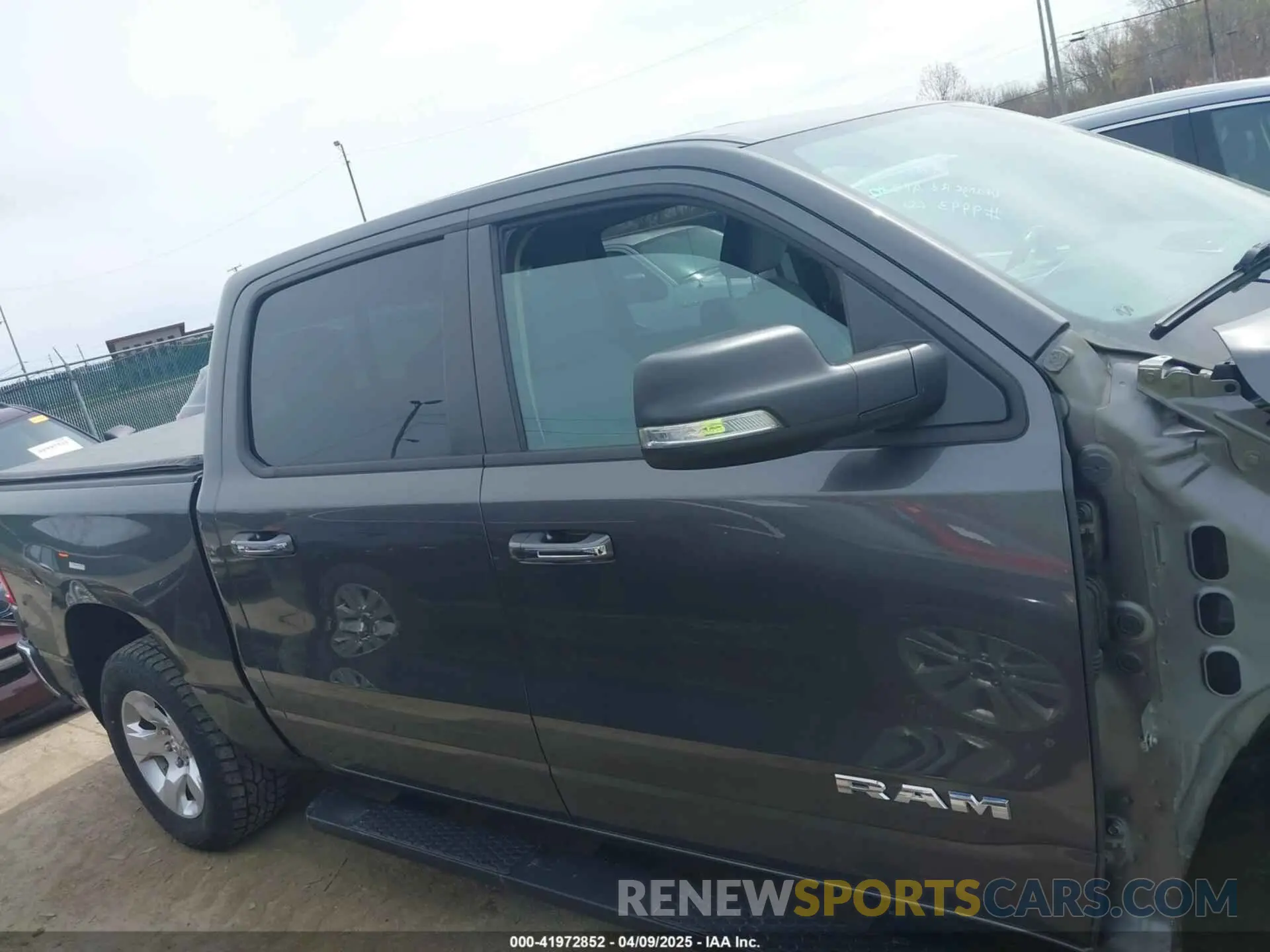 14 Photograph of a damaged car 1C6SRFFT7KN876256 RAM 1500 2019