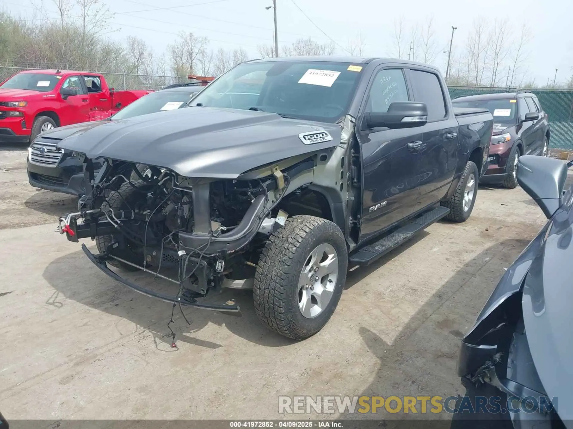 2 Photograph of a damaged car 1C6SRFFT7KN876256 RAM 1500 2019