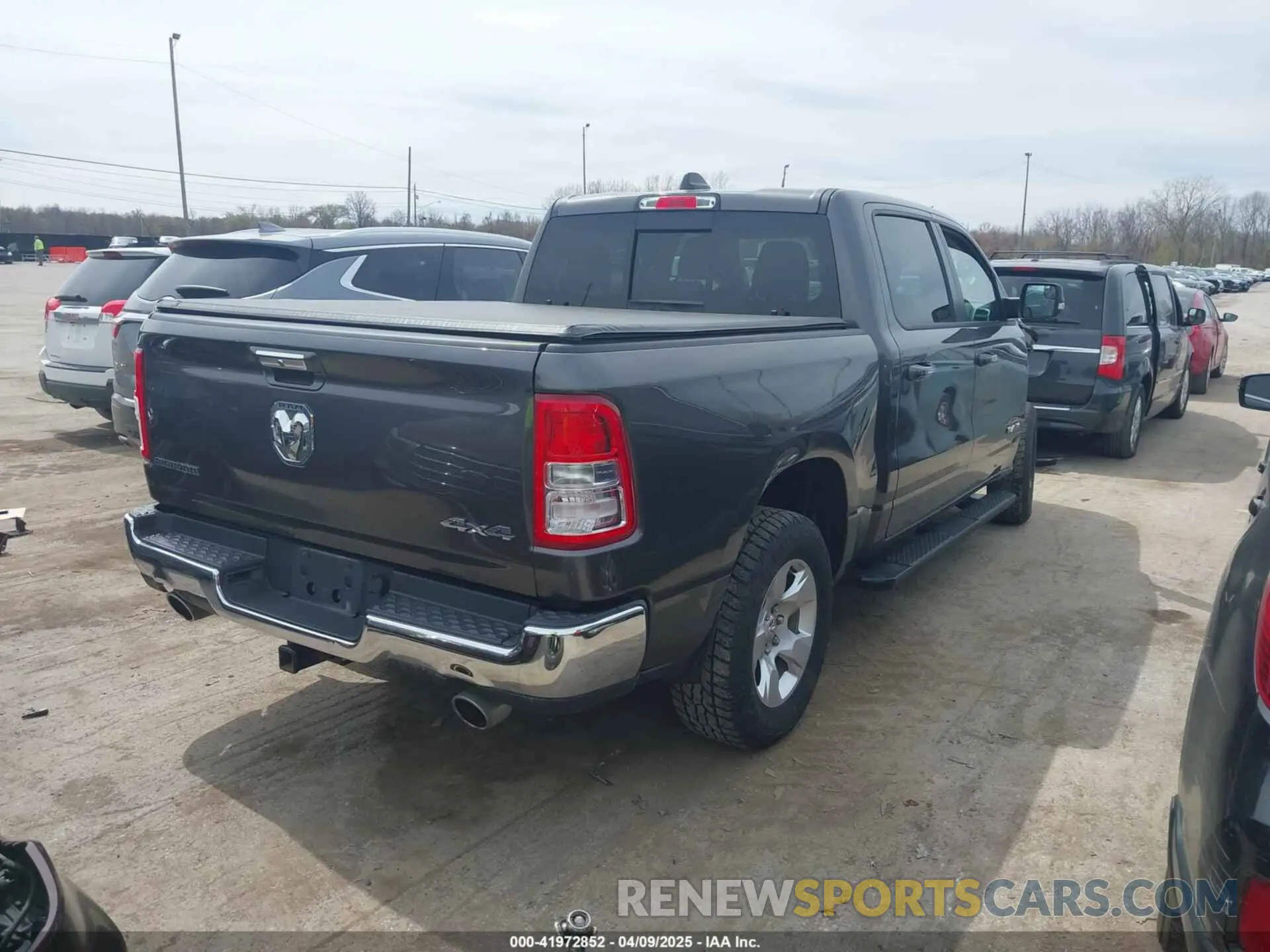 4 Photograph of a damaged car 1C6SRFFT7KN876256 RAM 1500 2019
