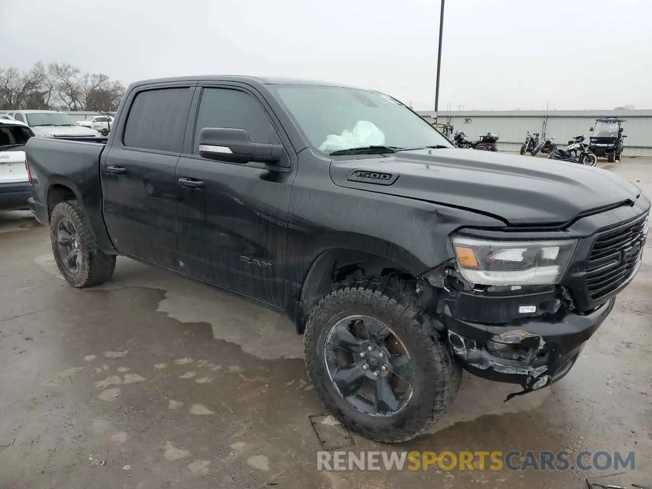 4 Photograph of a damaged car 1C6SRFFT8KN540180 RAM 1500 2019
