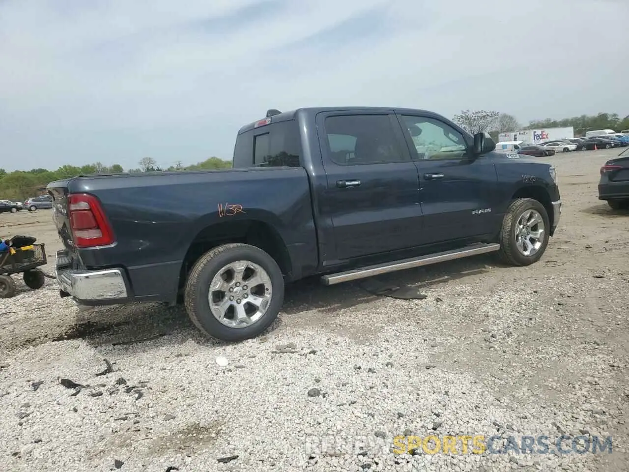 3 Photograph of a damaged car 1C6SRFFT8KN566357 RAM 1500 2019