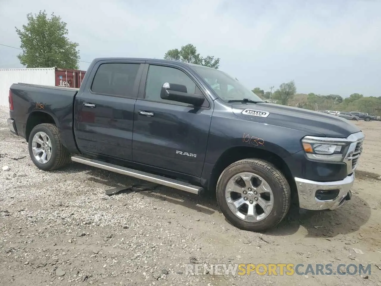 4 Photograph of a damaged car 1C6SRFFT8KN566357 RAM 1500 2019