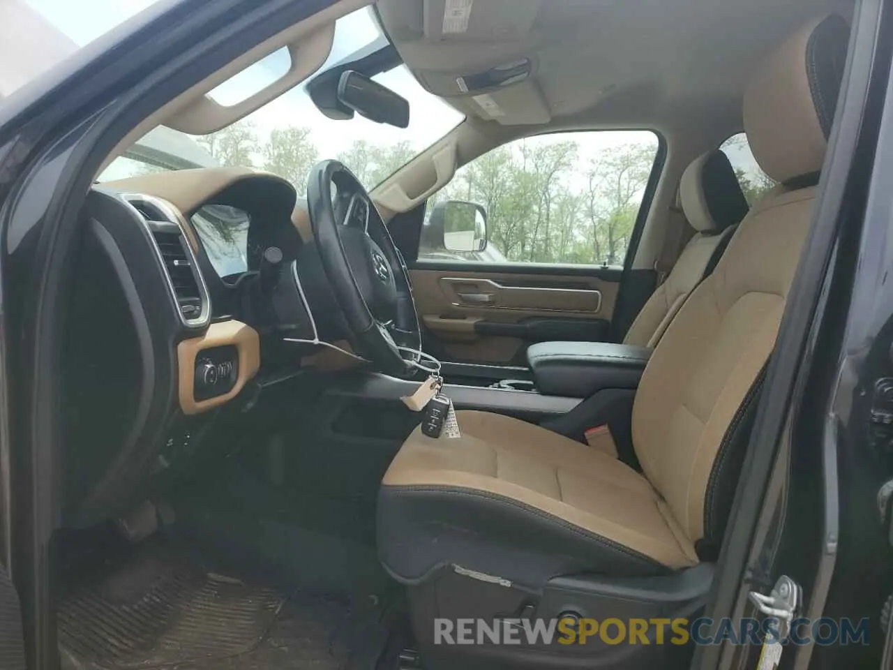 7 Photograph of a damaged car 1C6SRFFT8KN566357 RAM 1500 2019