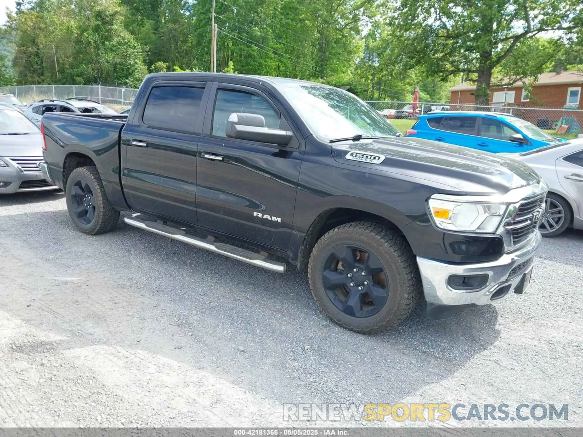 1 Photograph of a damaged car 1C6SRFFT8KN575141 RAM 1500 2019