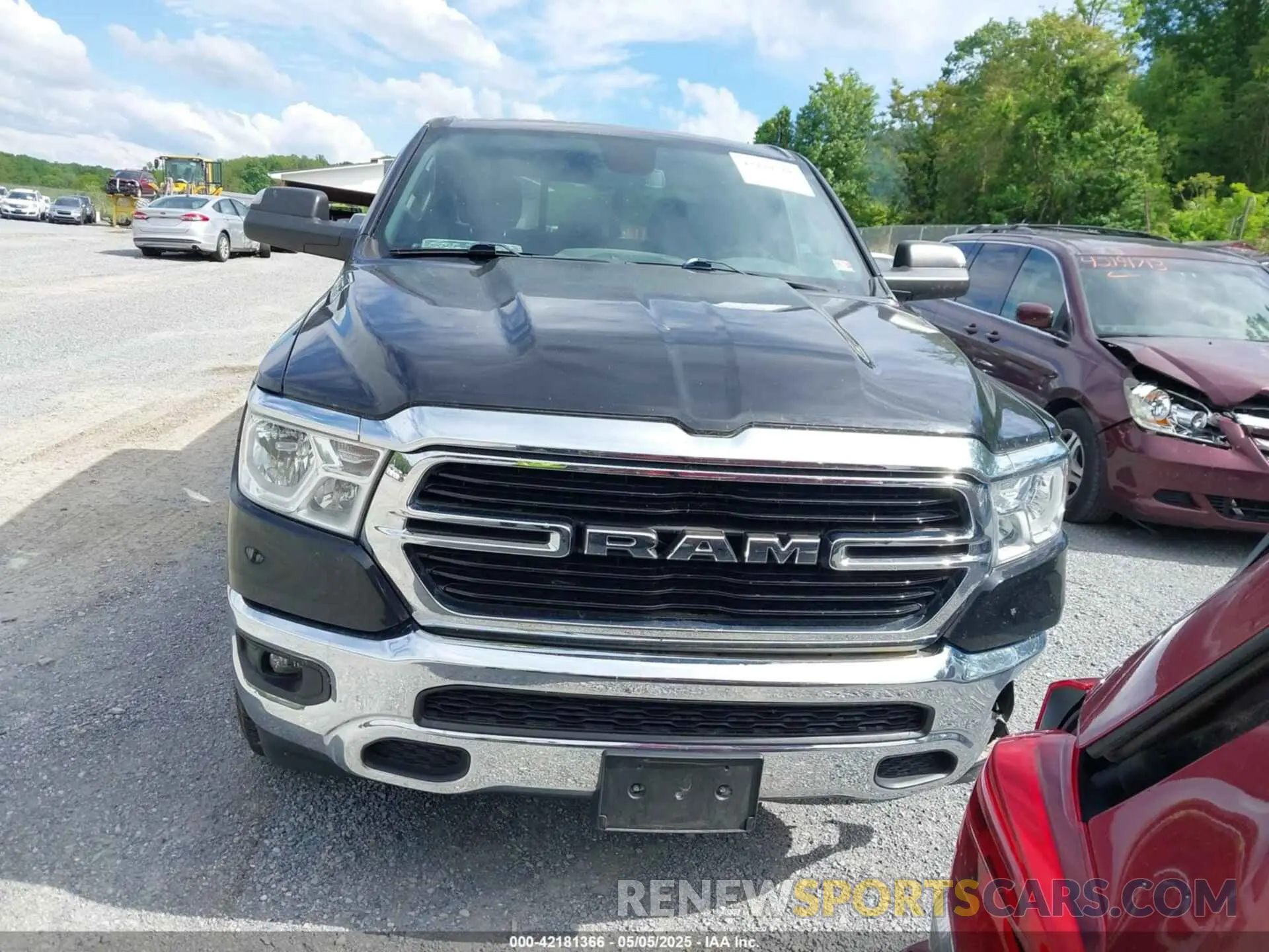 13 Photograph of a damaged car 1C6SRFFT8KN575141 RAM 1500 2019