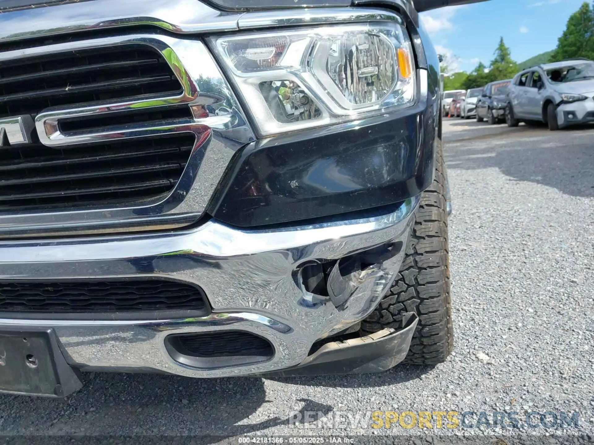 21 Photograph of a damaged car 1C6SRFFT8KN575141 RAM 1500 2019