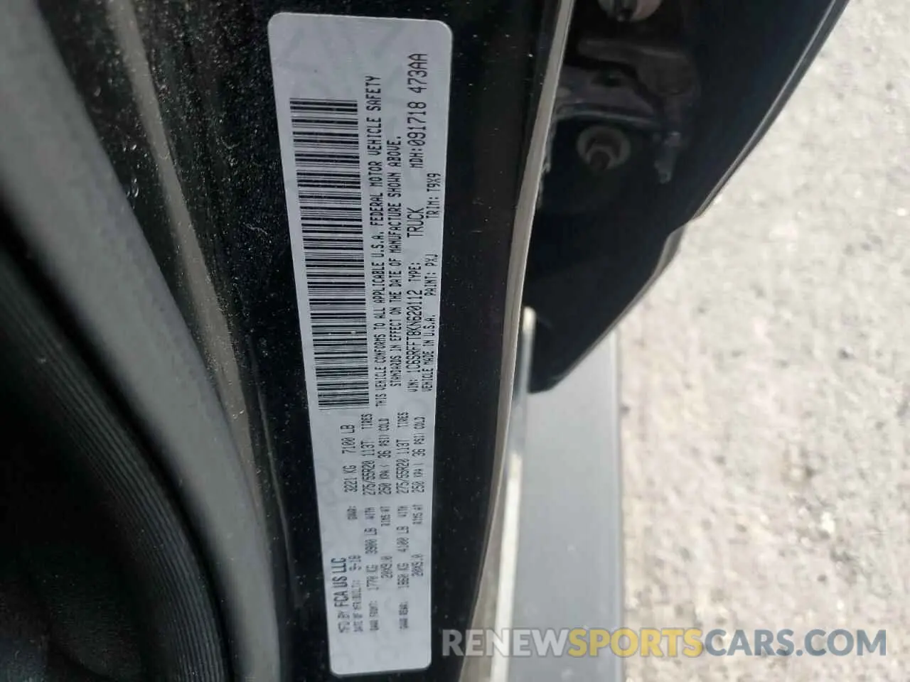13 Photograph of a damaged car 1C6SRFFT8KN620112 RAM 1500 2019