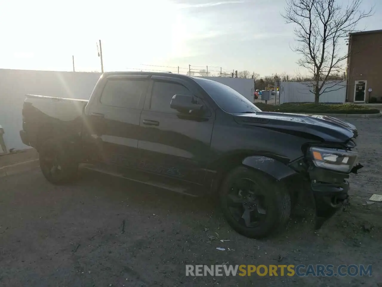 4 Photograph of a damaged car 1C6SRFFT8KN620112 RAM 1500 2019