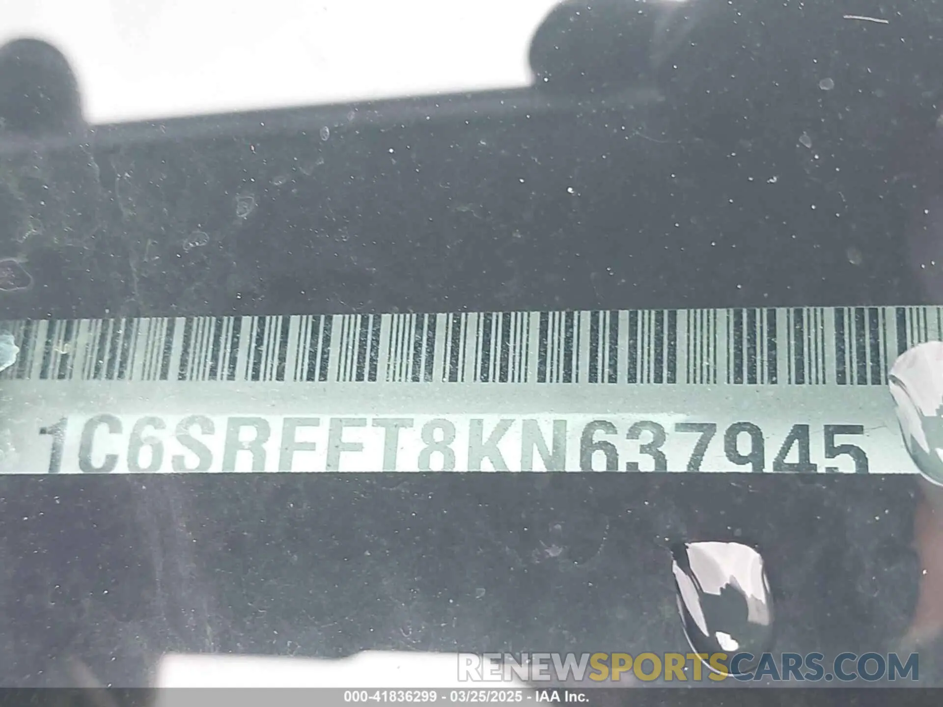 9 Photograph of a damaged car 1C6SRFFT8KN637945 RAM 1500 2019
