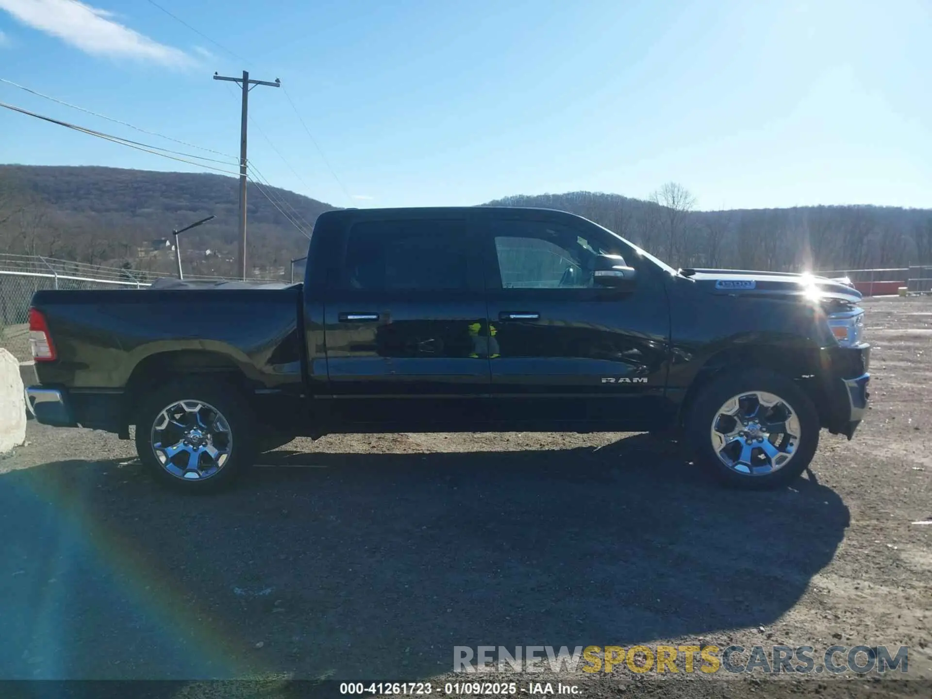 13 Photograph of a damaged car 1C6SRFFT8KN659895 RAM 1500 2019