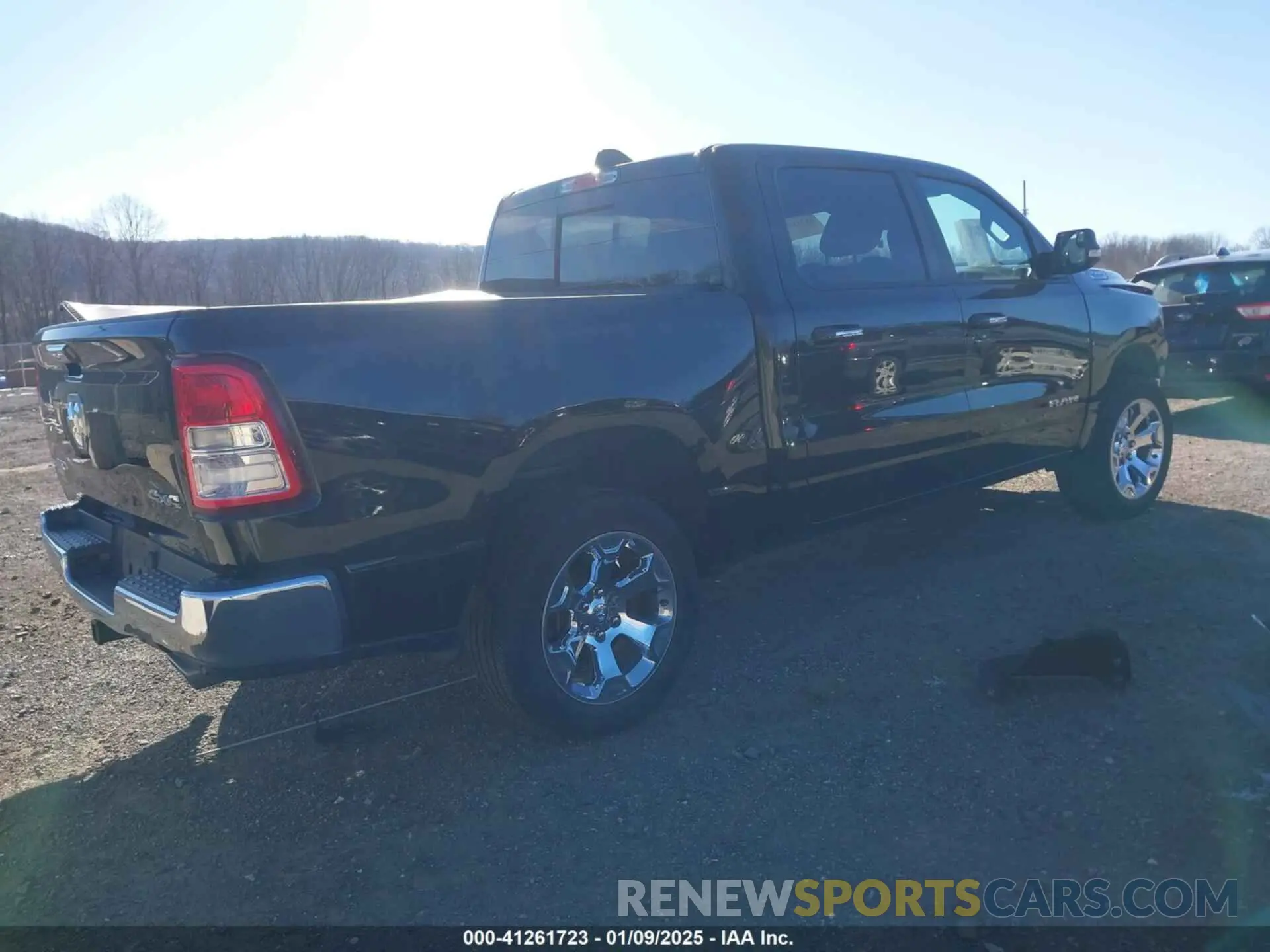 4 Photograph of a damaged car 1C6SRFFT8KN659895 RAM 1500 2019