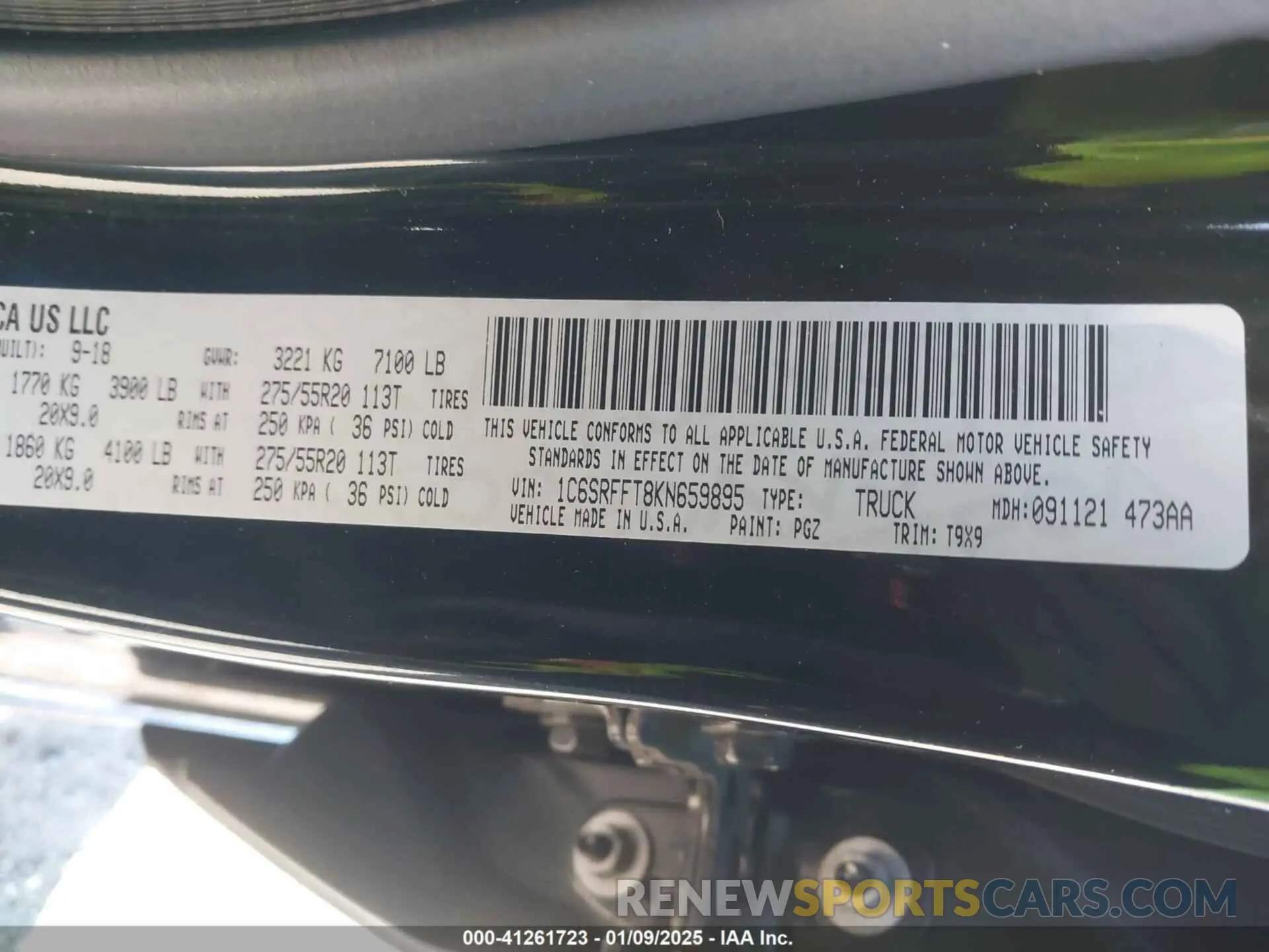 9 Photograph of a damaged car 1C6SRFFT8KN659895 RAM 1500 2019