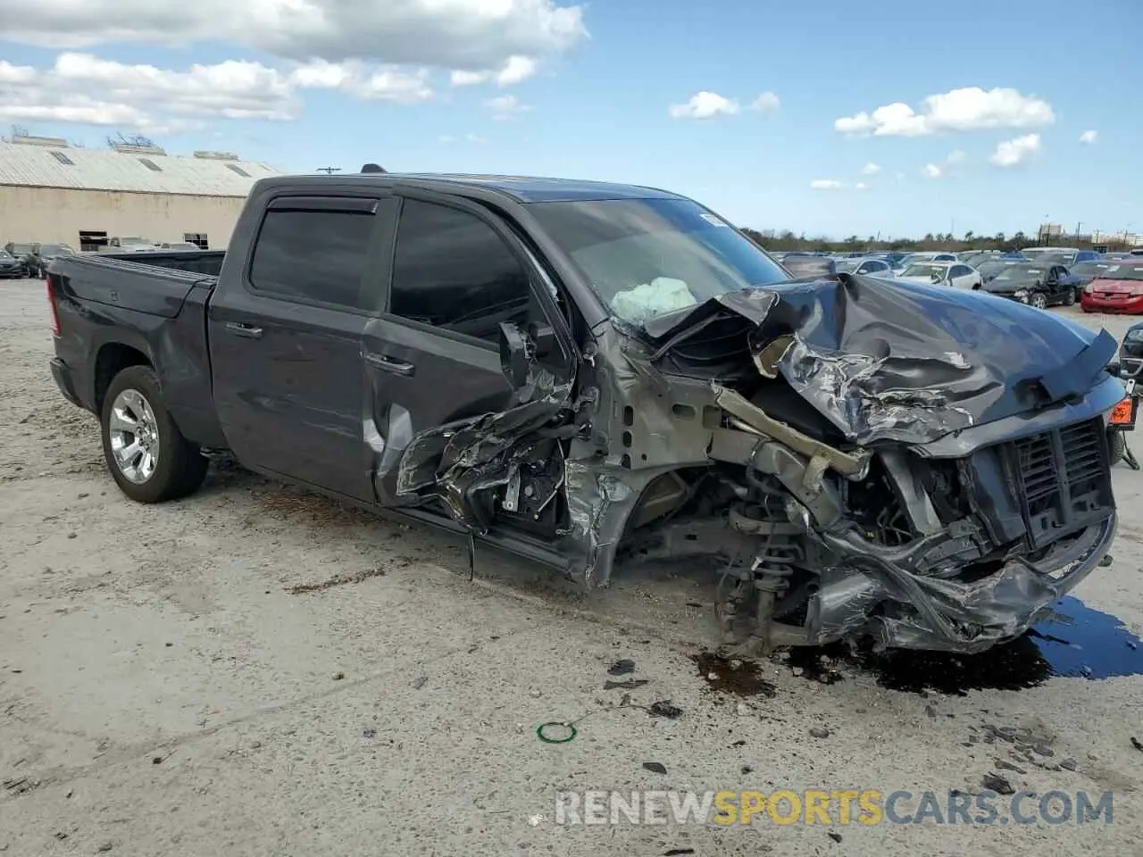 4 Photograph of a damaged car 1C6SRFFT8KN719898 RAM 1500 2019