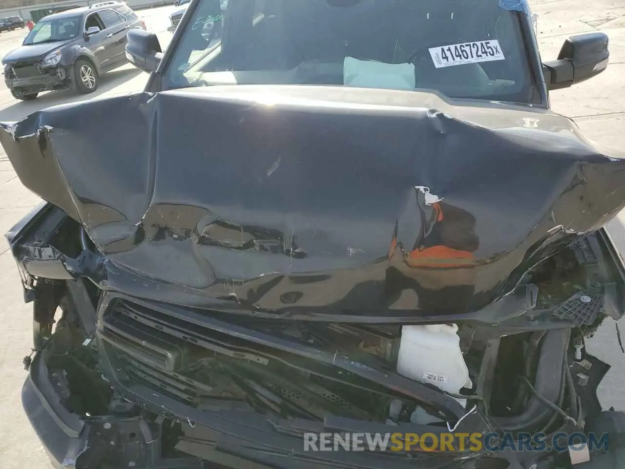 11 Photograph of a damaged car 1C6SRFFT8KN781642 RAM 1500 2019