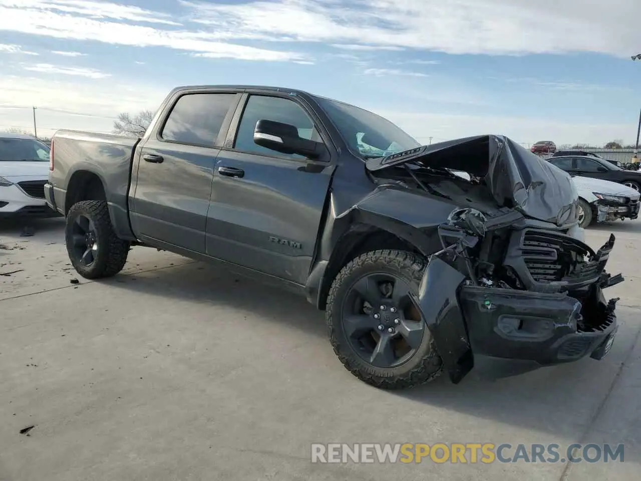 4 Photograph of a damaged car 1C6SRFFT8KN781642 RAM 1500 2019