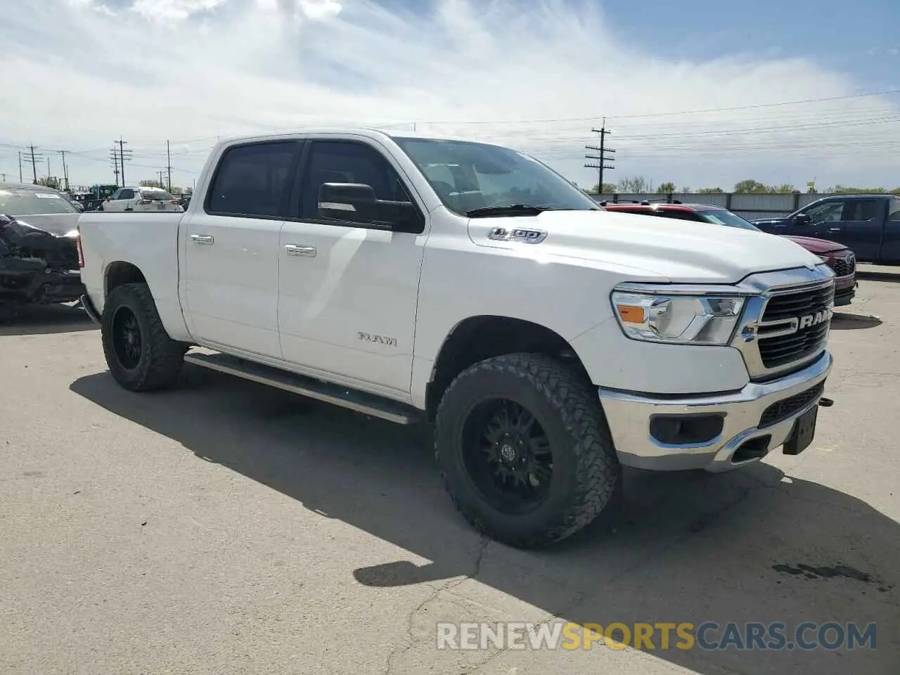 4 Photograph of a damaged car 1C6SRFFT8KN798912 RAM 1500 2019