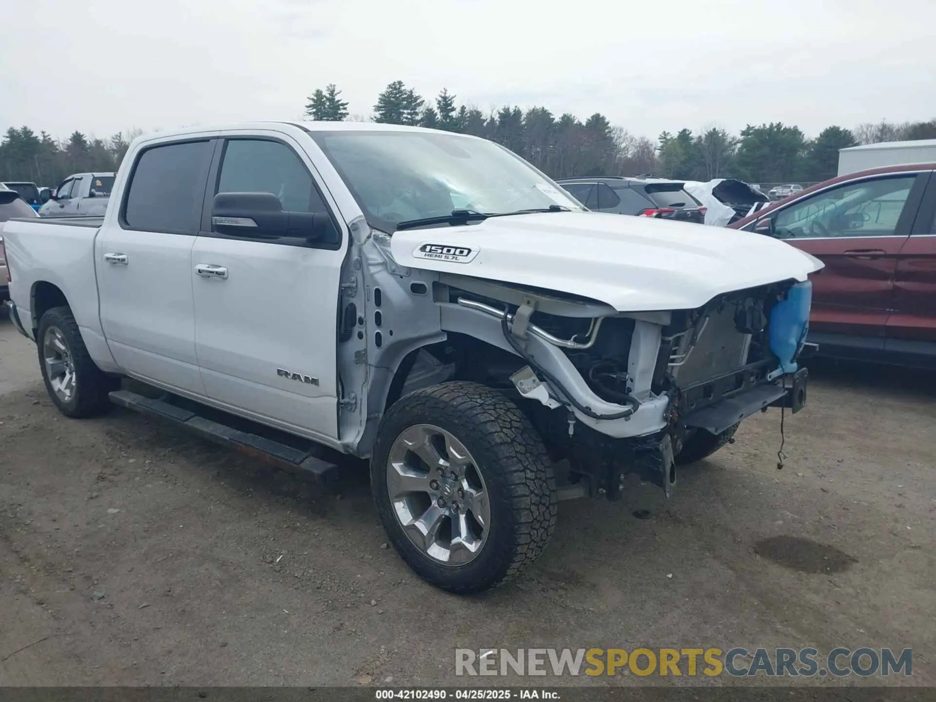 1 Photograph of a damaged car 1C6SRFFT8KN885693 RAM 1500 2019