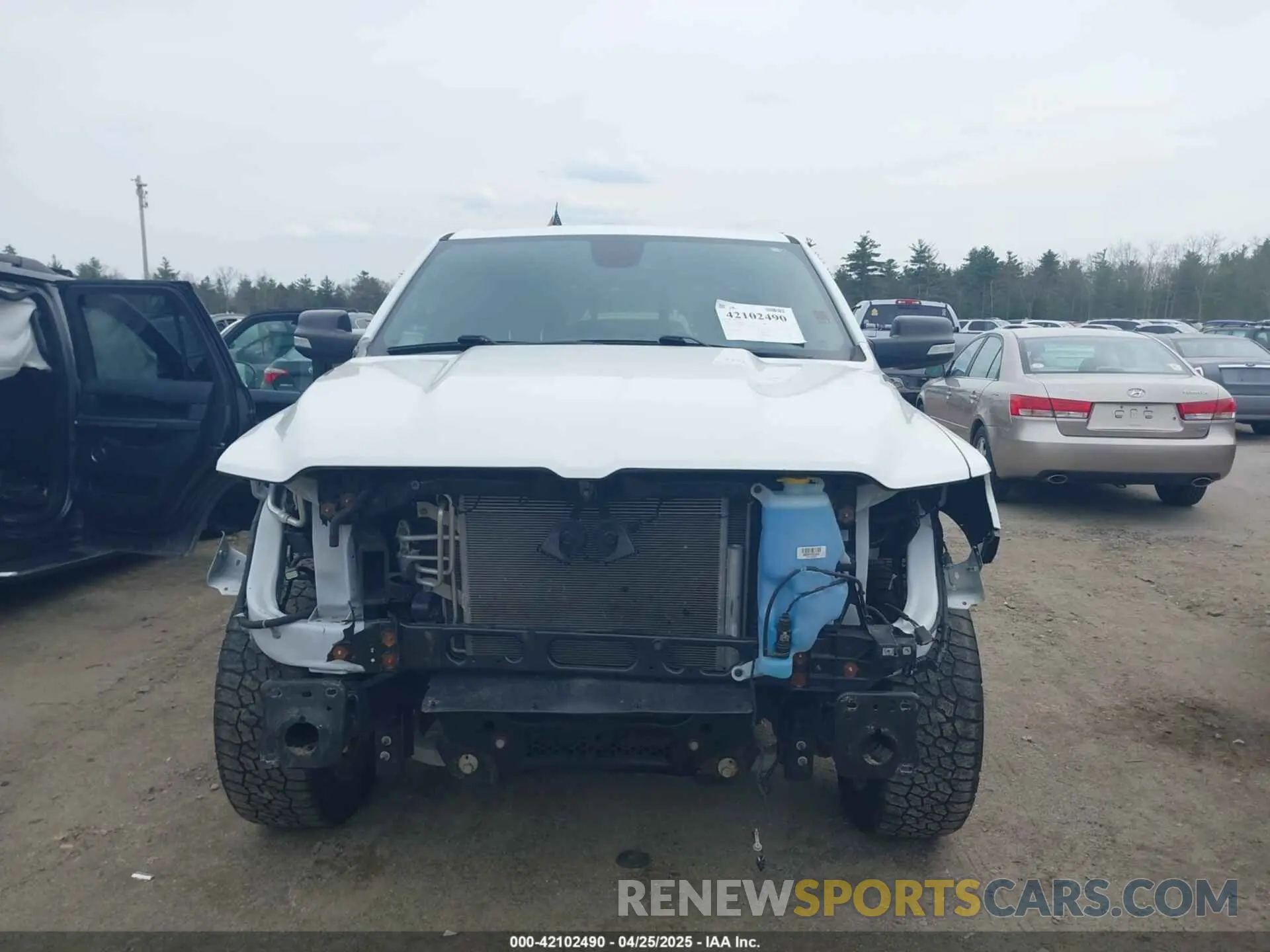 13 Photograph of a damaged car 1C6SRFFT8KN885693 RAM 1500 2019