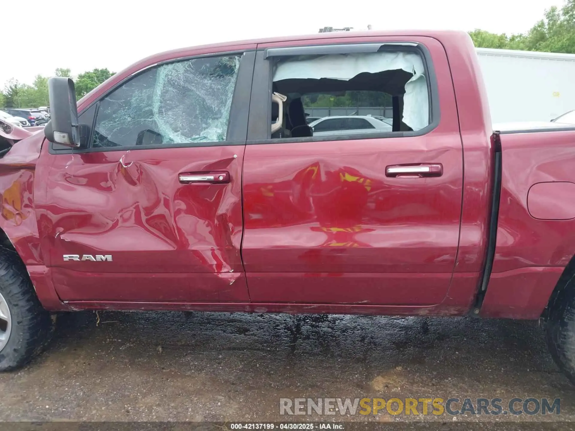 14 Photograph of a damaged car 1C6SRFFT9KN574273 RAM 1500 2019