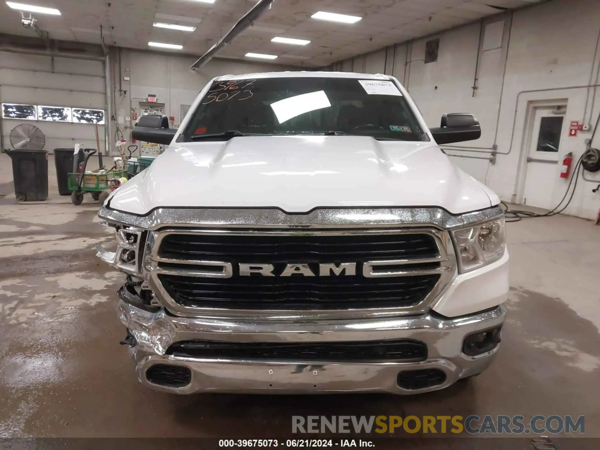 13 Photograph of a damaged car 1C6SRFFT9KN575214 RAM 1500 2019