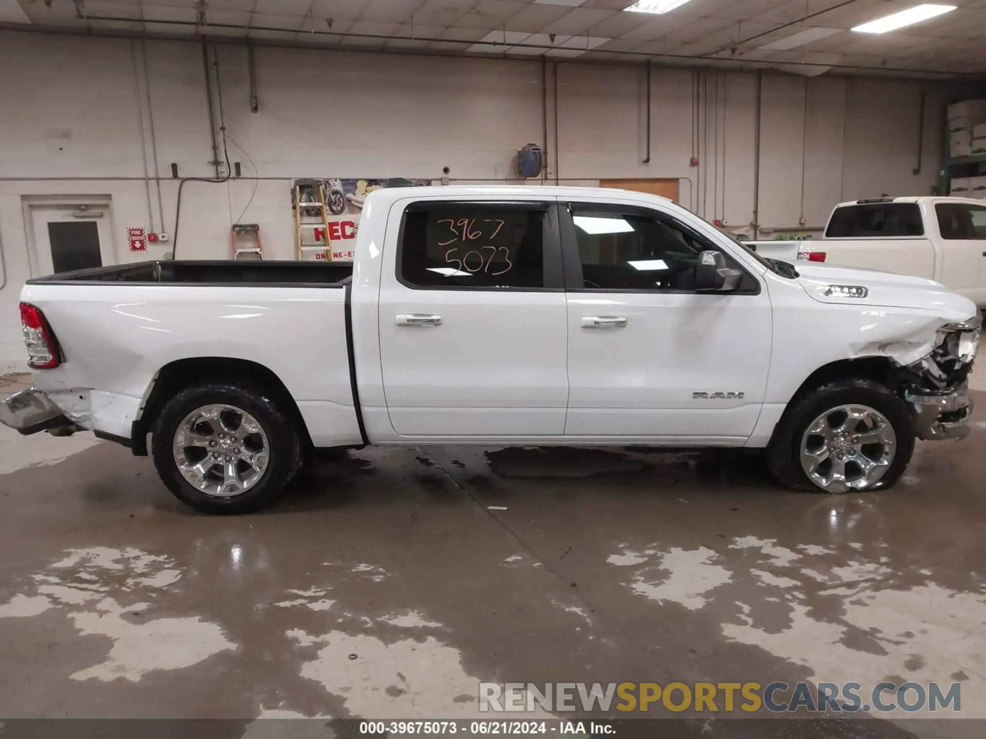 14 Photograph of a damaged car 1C6SRFFT9KN575214 RAM 1500 2019