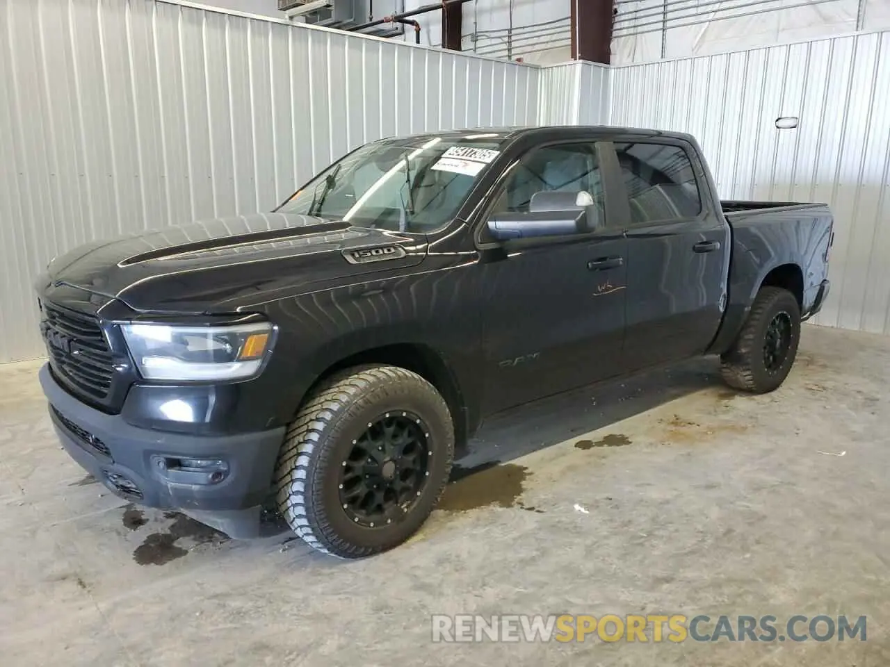 1 Photograph of a damaged car 1C6SRFFT9KN591381 RAM 1500 2019