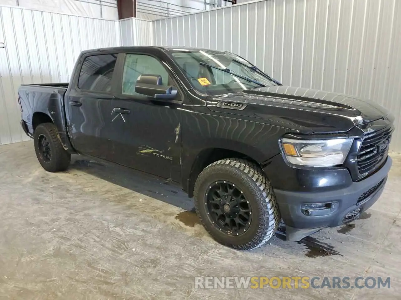 4 Photograph of a damaged car 1C6SRFFT9KN591381 RAM 1500 2019