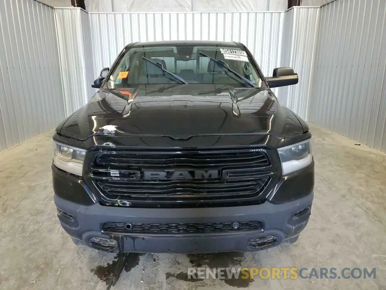 5 Photograph of a damaged car 1C6SRFFT9KN591381 RAM 1500 2019