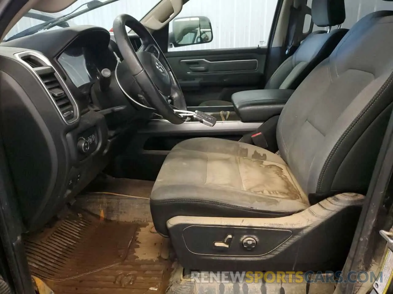 7 Photograph of a damaged car 1C6SRFFT9KN591381 RAM 1500 2019