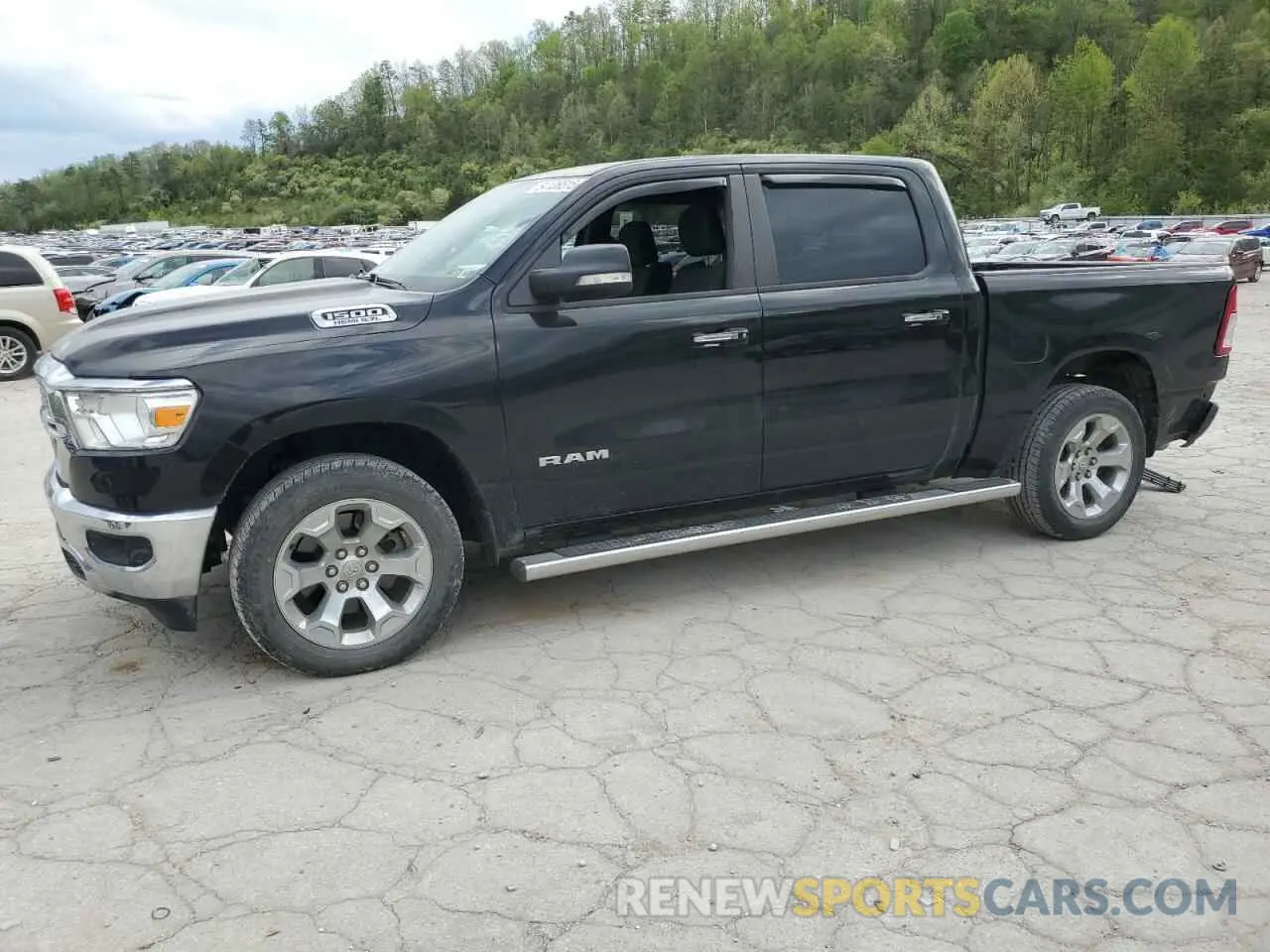 1 Photograph of a damaged car 1C6SRFFT9KN692730 RAM 1500 2019