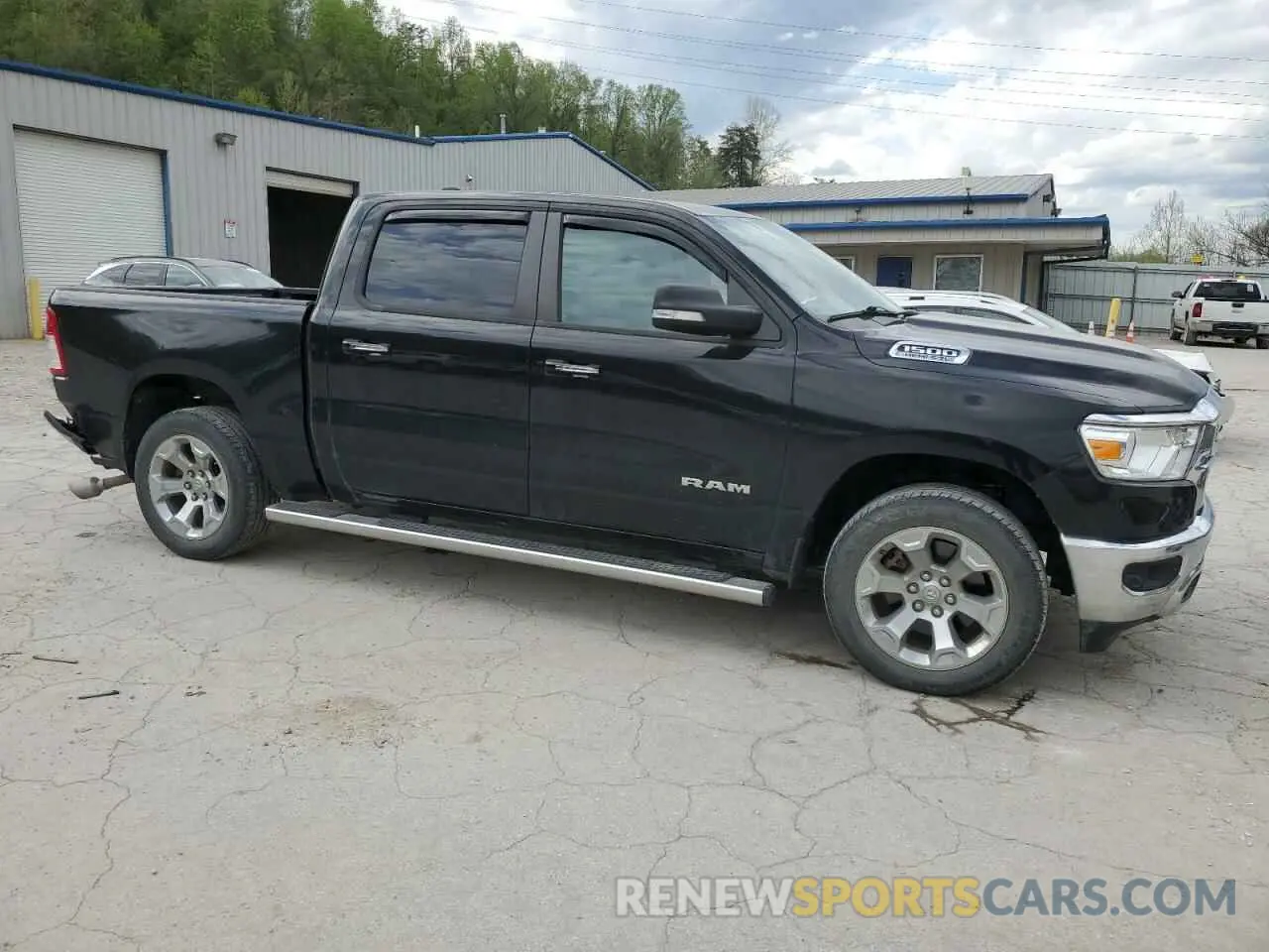 4 Photograph of a damaged car 1C6SRFFT9KN692730 RAM 1500 2019