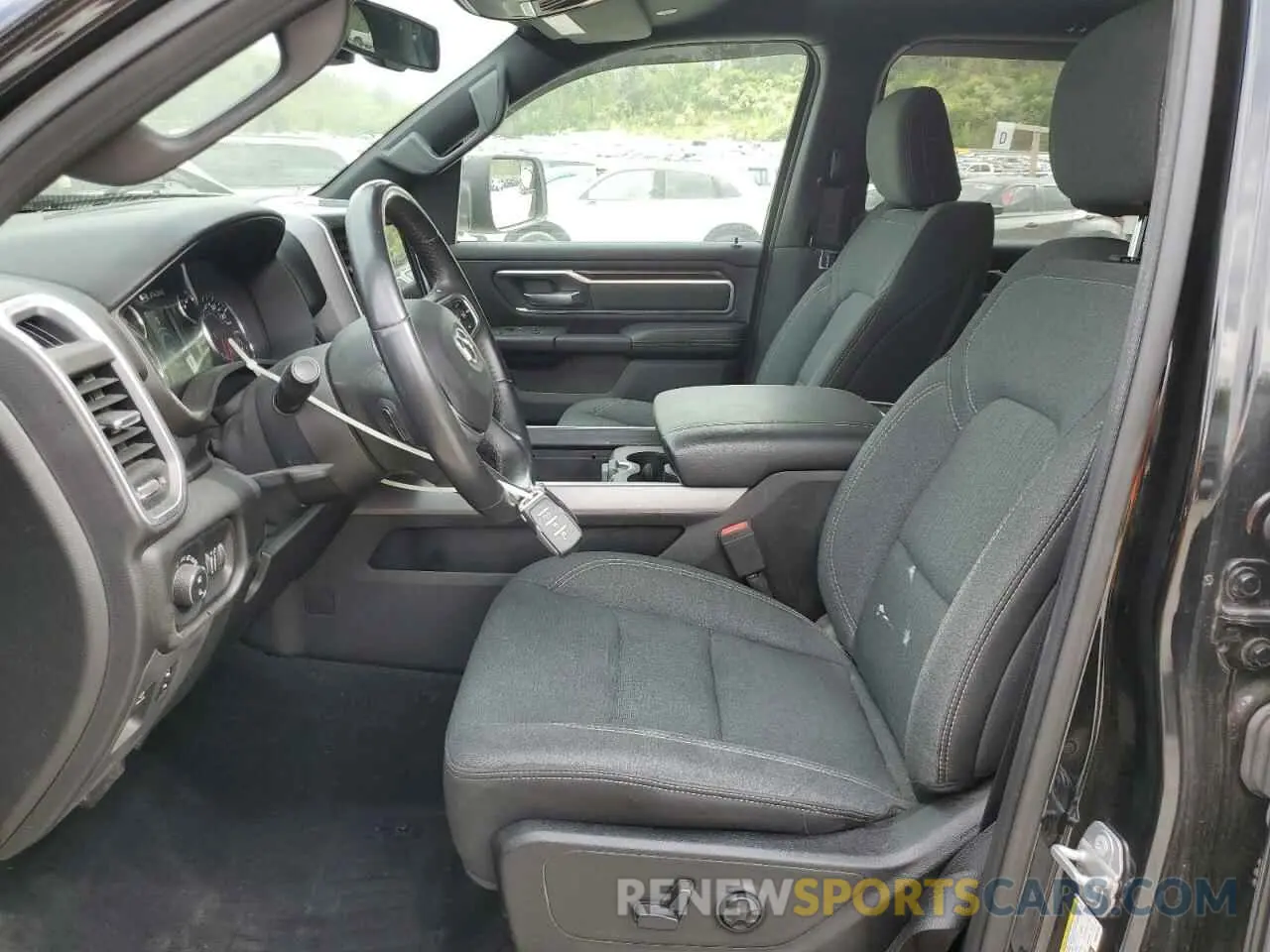 7 Photograph of a damaged car 1C6SRFFT9KN692730 RAM 1500 2019