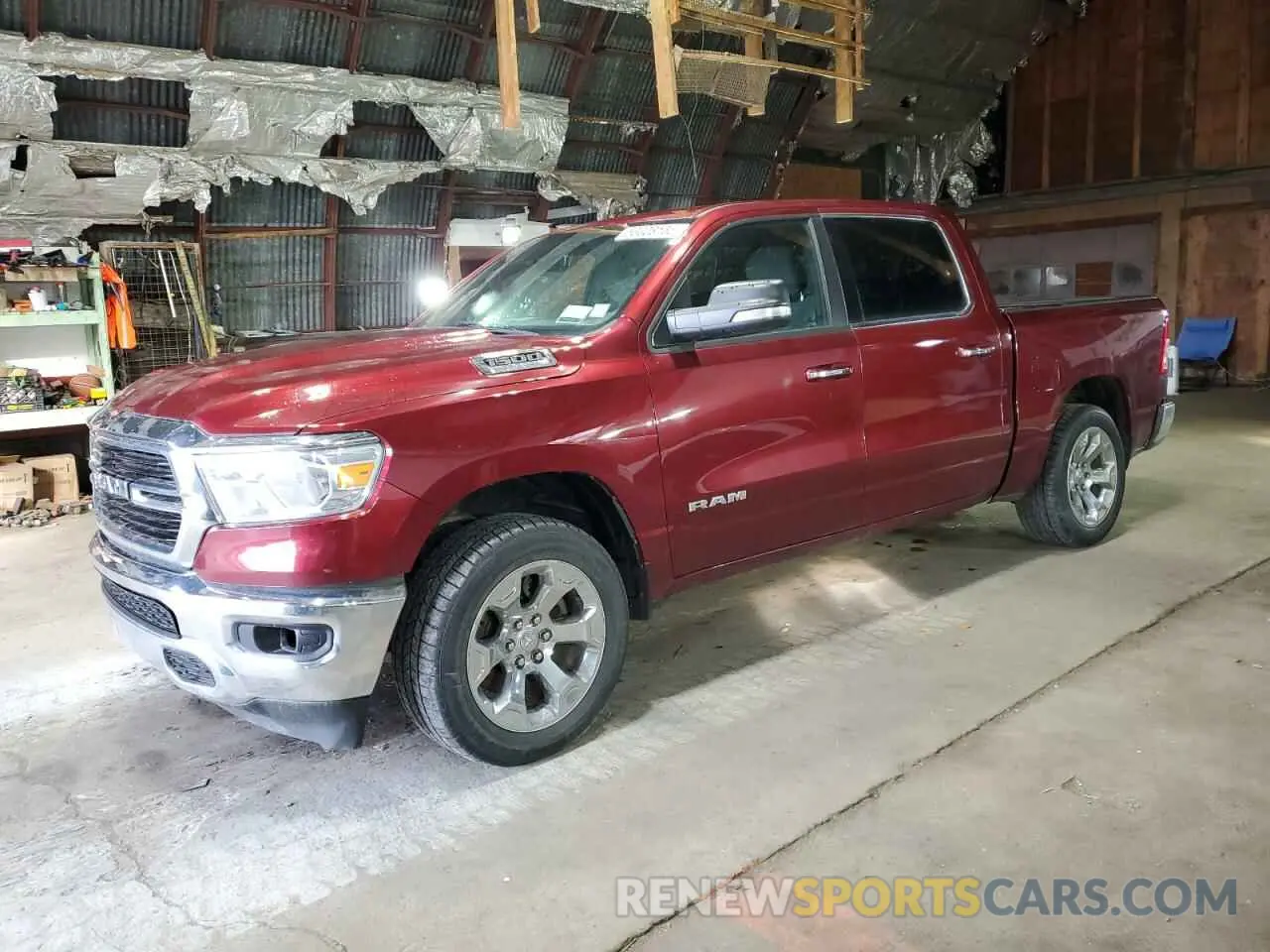 1 Photograph of a damaged car 1C6SRFFT9KN878851 RAM 1500 2019