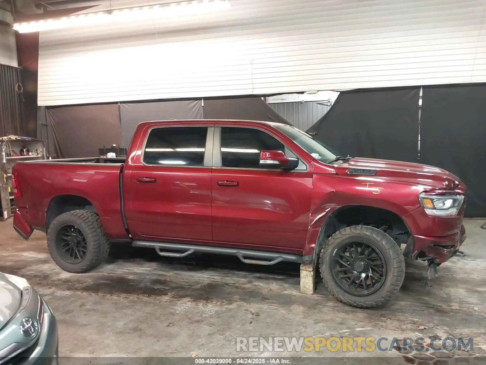 13 Photograph of a damaged car 1C6SRFFTXKN607457 RAM 1500 2019