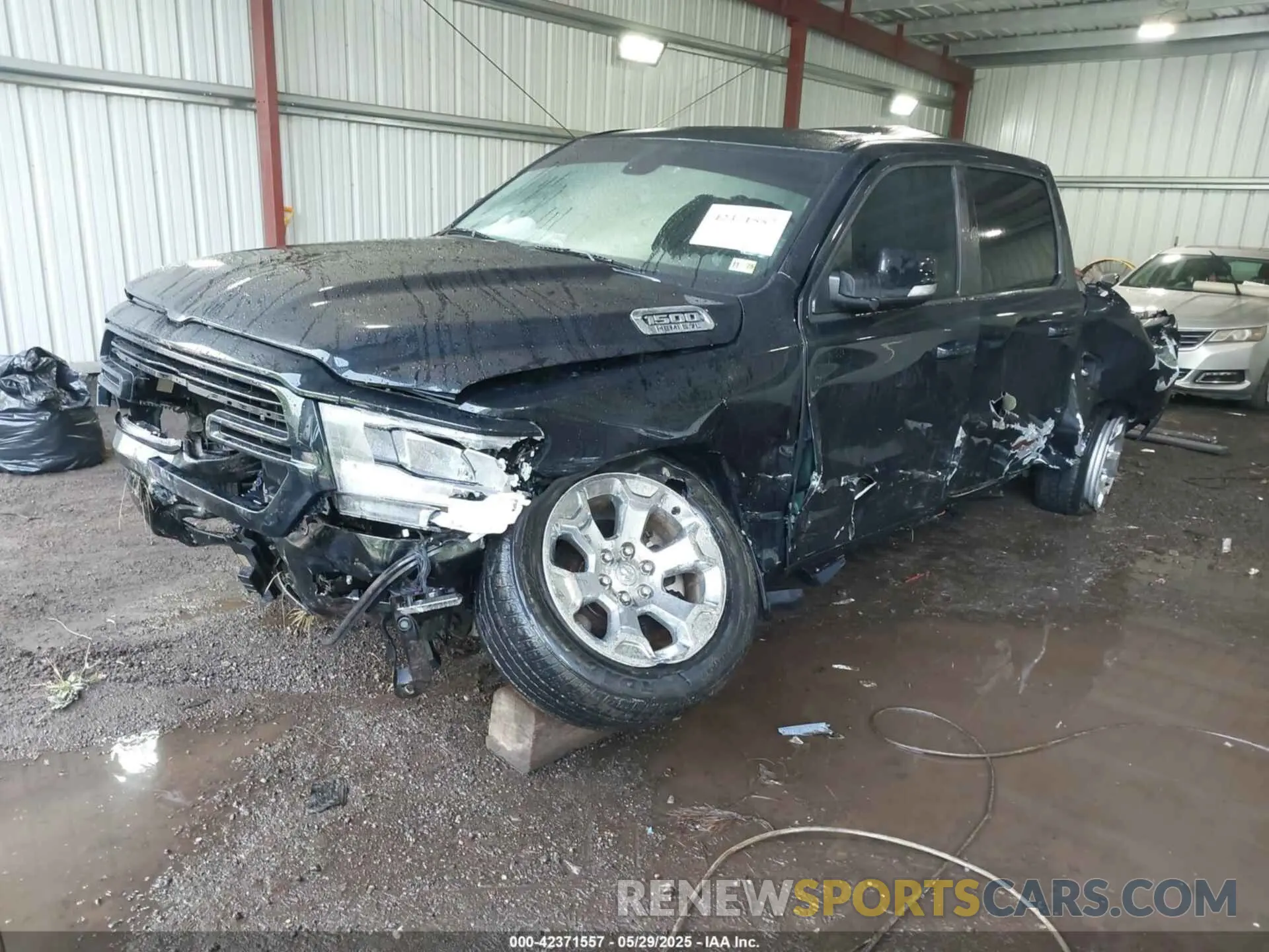 2 Photograph of a damaged car 1C6SRFFTXKN674611 RAM 1500 2019