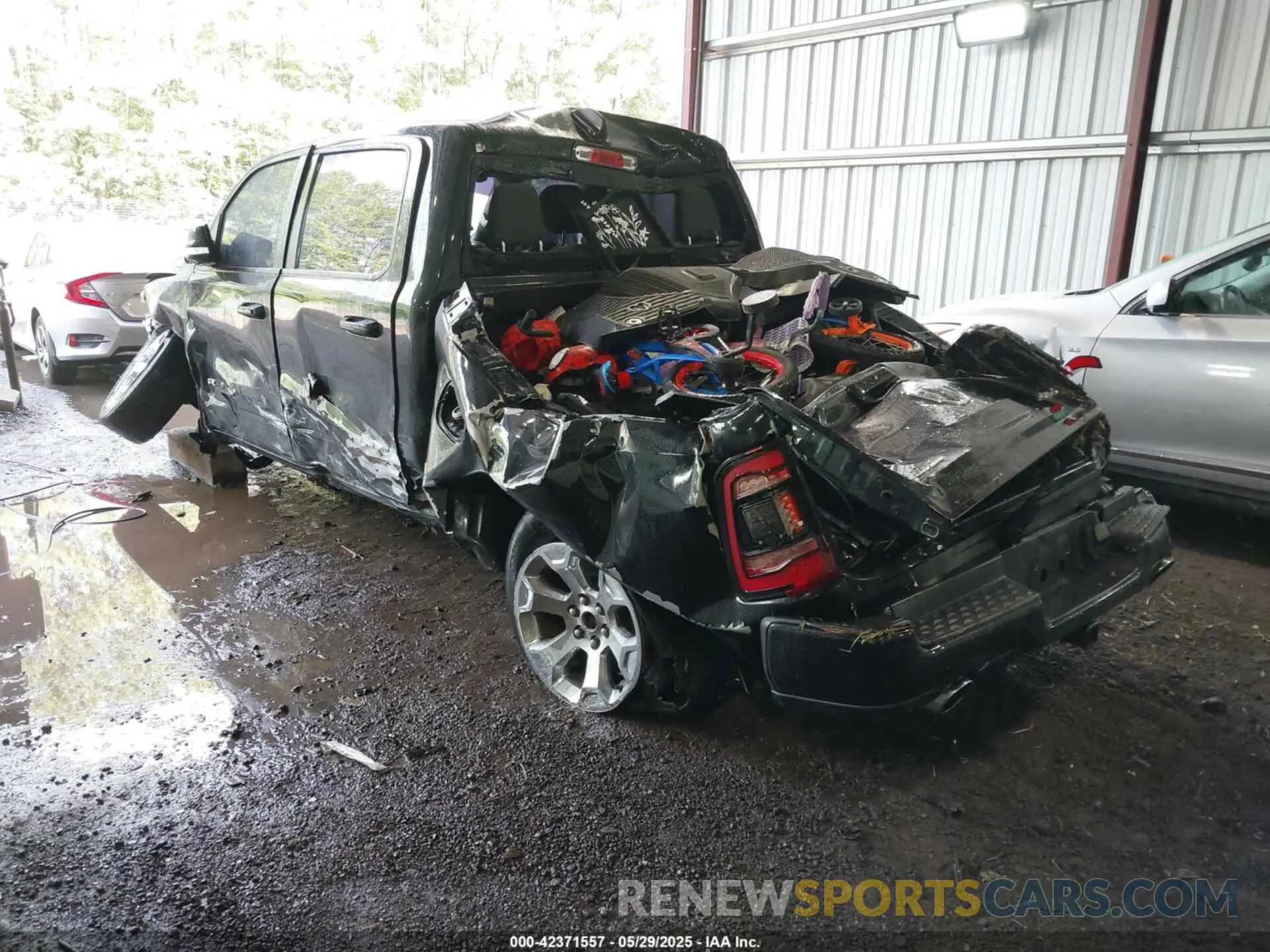 3 Photograph of a damaged car 1C6SRFFTXKN674611 RAM 1500 2019