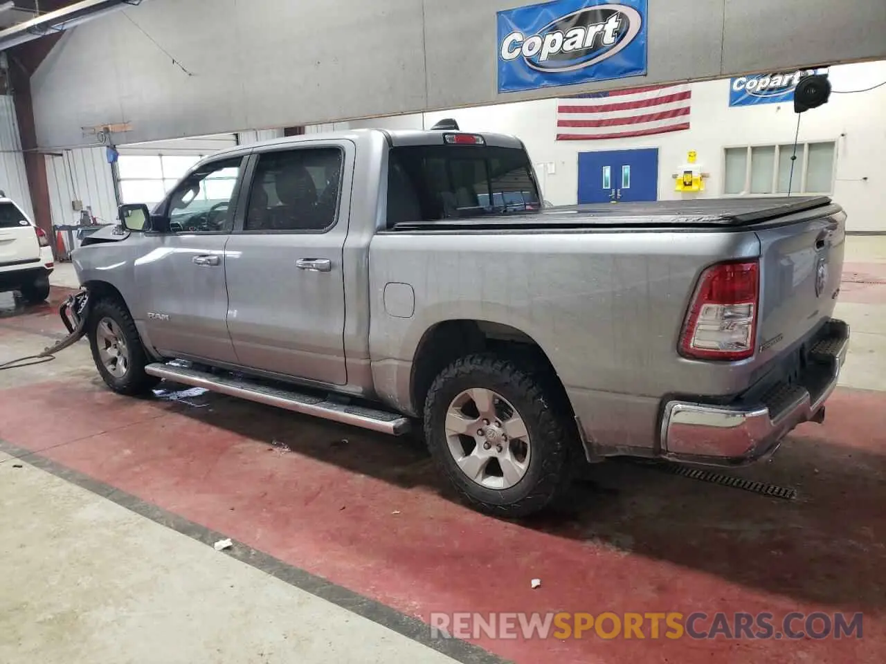 2 Photograph of a damaged car 1C6SRFFTXKN734516 RAM 1500 2019