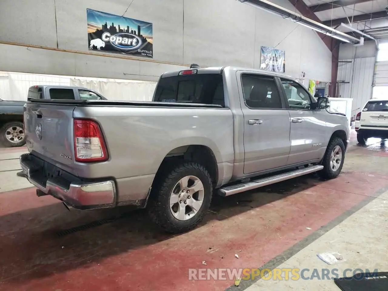3 Photograph of a damaged car 1C6SRFFTXKN734516 RAM 1500 2019