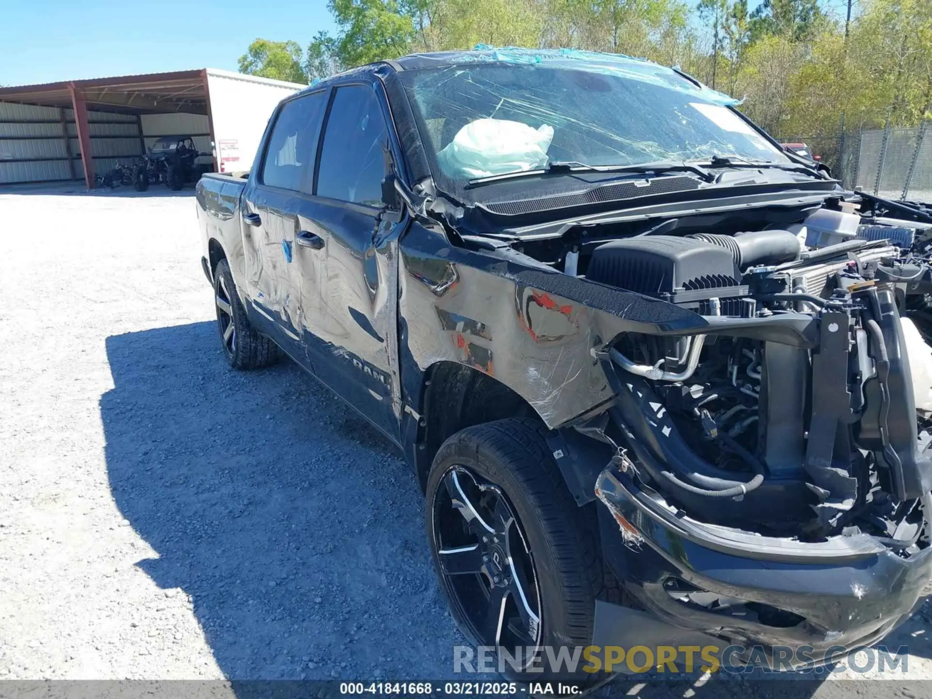 1 Photograph of a damaged car 1C6SRFFTXKN796983 RAM 1500 2019